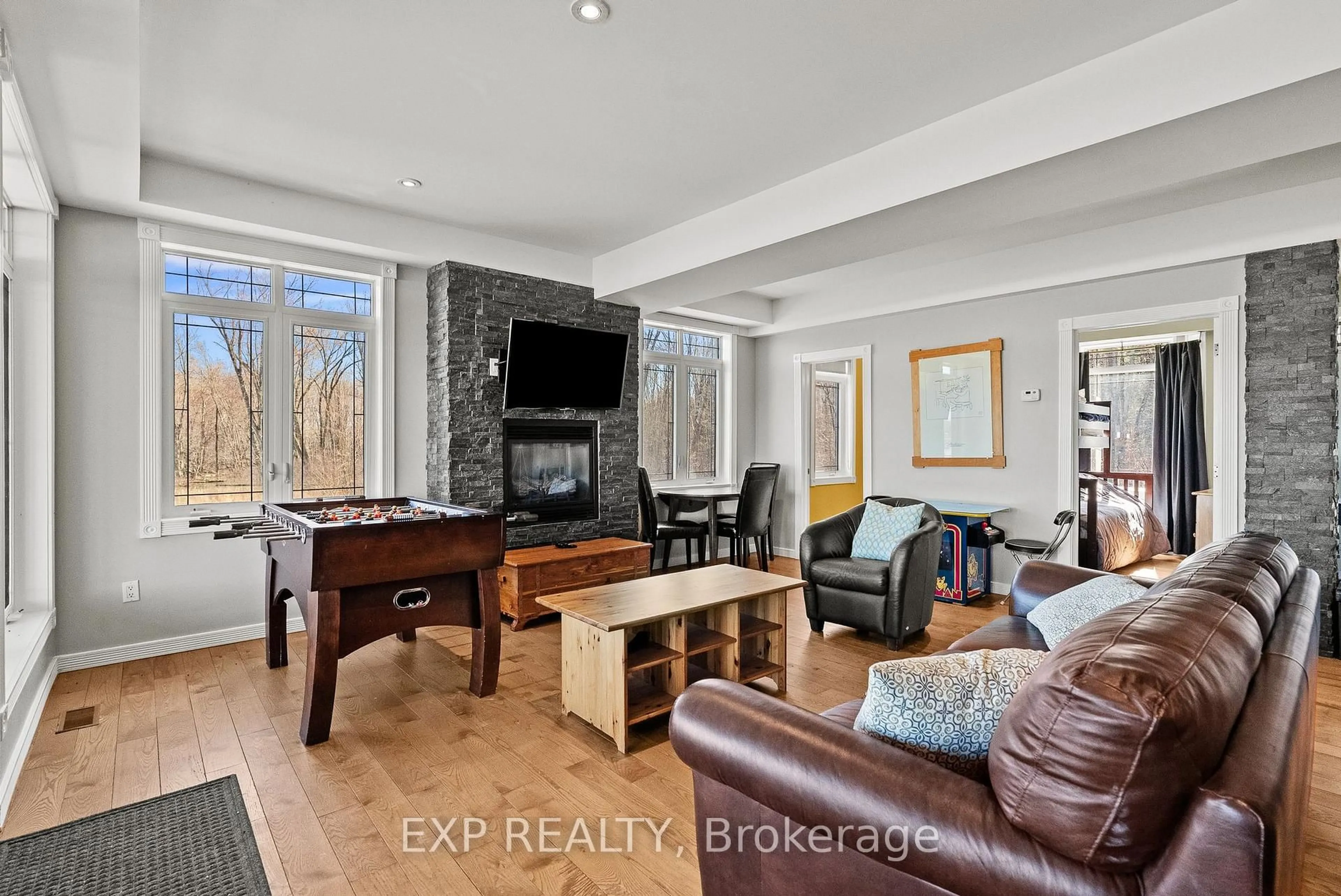 Living room with furniture, unknown for 102 Allbirch Rd, Ottawa Ontario K0A 3M0