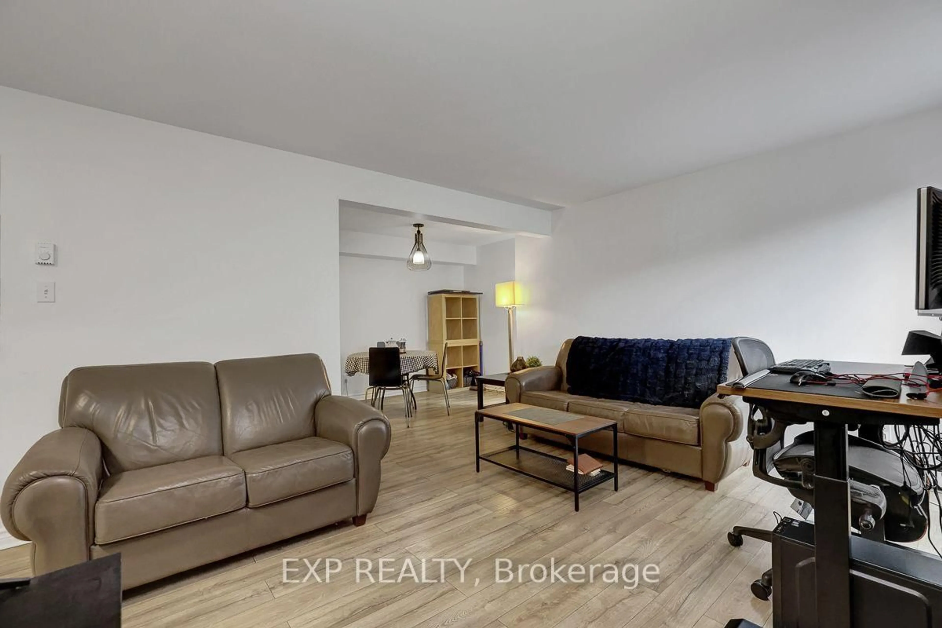 Living room with furniture, unknown for 20 Hart Ave #F, Ottawa Ontario K1K 4H8