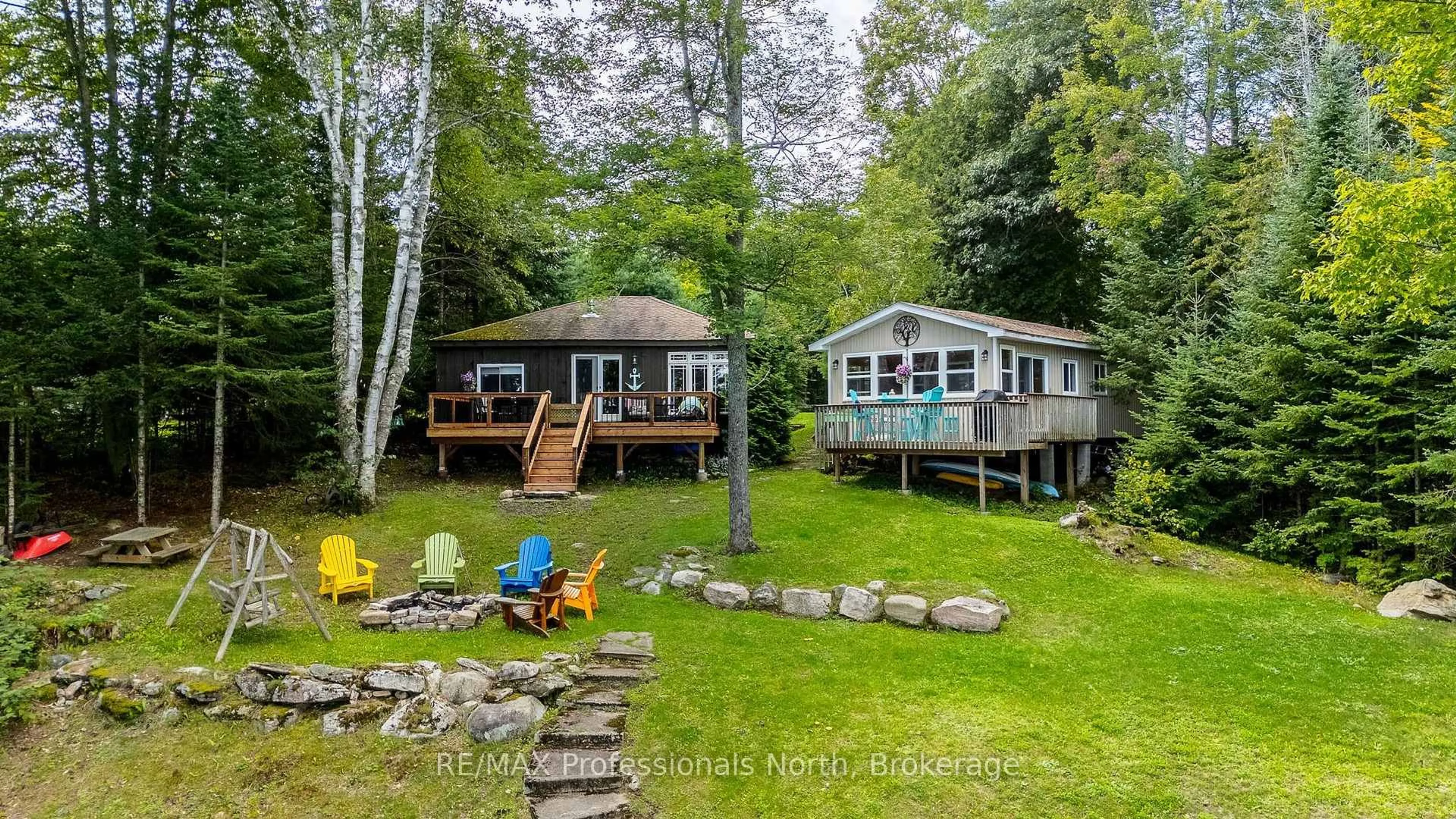 A pic from outside/outdoor area/front of a property/back of a property/a pic from drone, water/lake/river/ocean view for 17306 Highway 35 Highway, Algonquin Highlands Ontario K0M 1S0