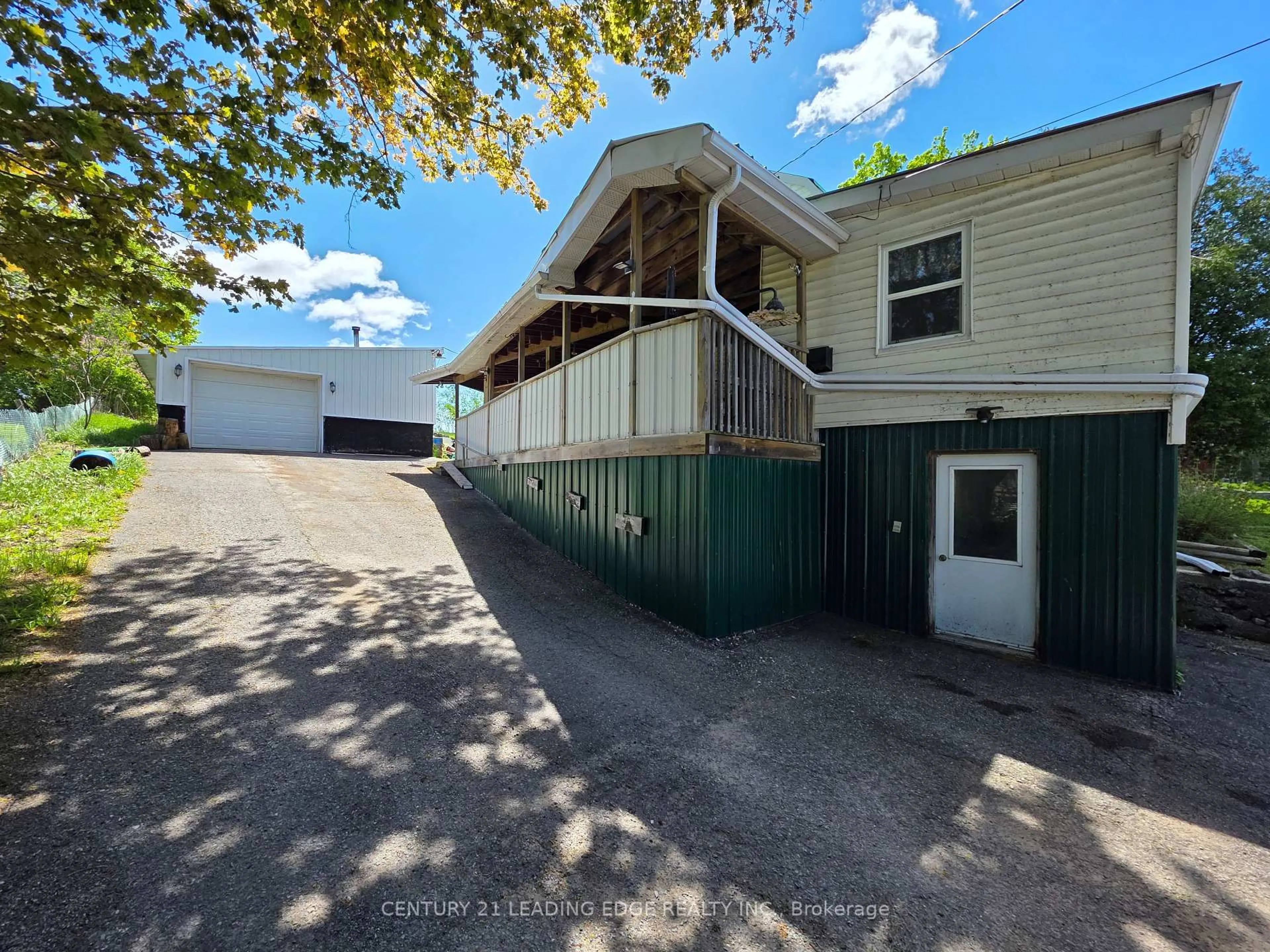 A pic from outside/outdoor area/front of a property/back of a property/a pic from drone, street for 3094 Lakefield Rd, Selwyn Ontario K9J 6X5