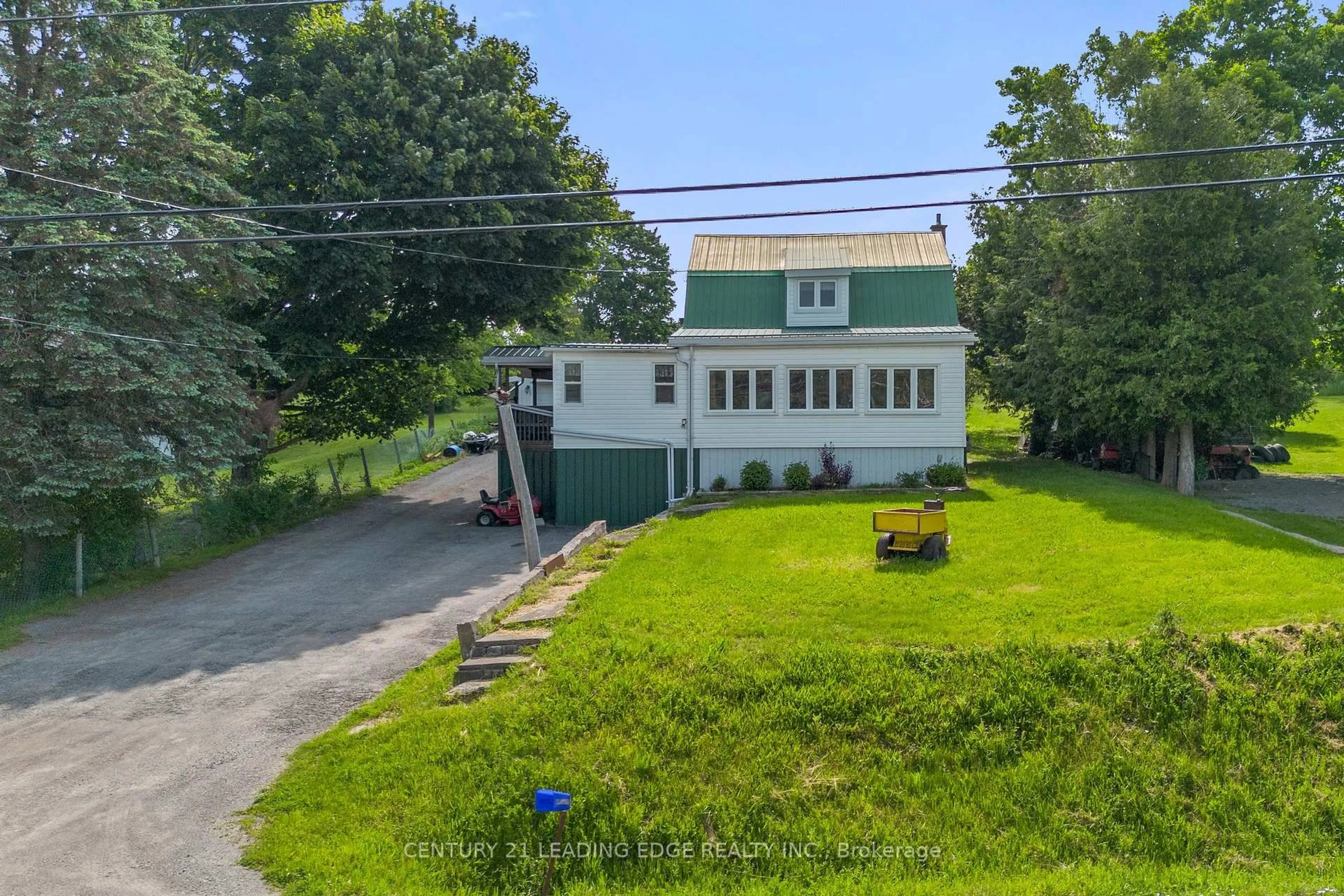 A pic from outside/outdoor area/front of a property/back of a property/a pic from drone, street for 3094 Lakefield Rd, Selwyn Ontario K9J 6X5