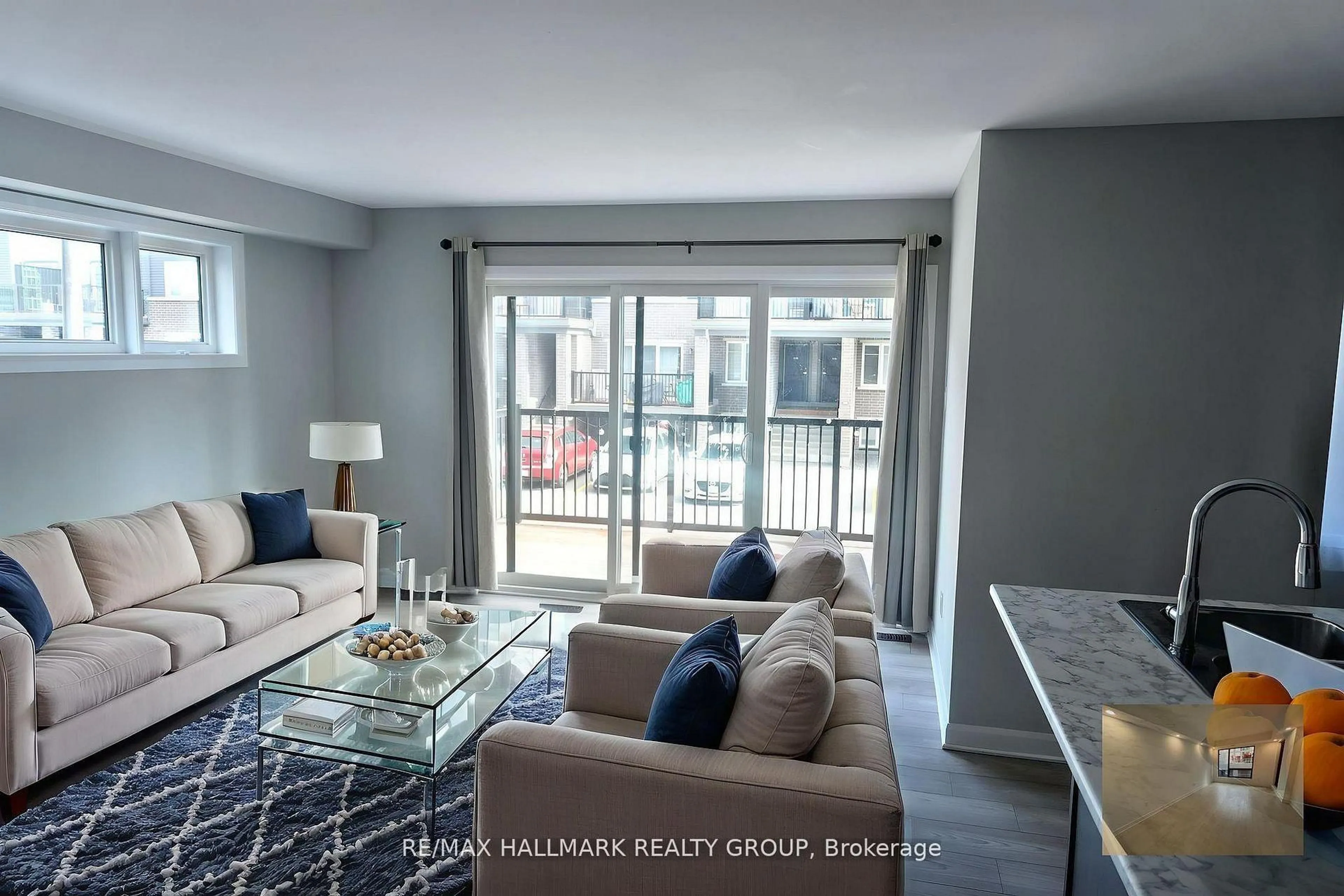 Living room with furniture, wood/laminate floor for 500 Eldorado Private #19, Ottawa Ontario K2K 1X9