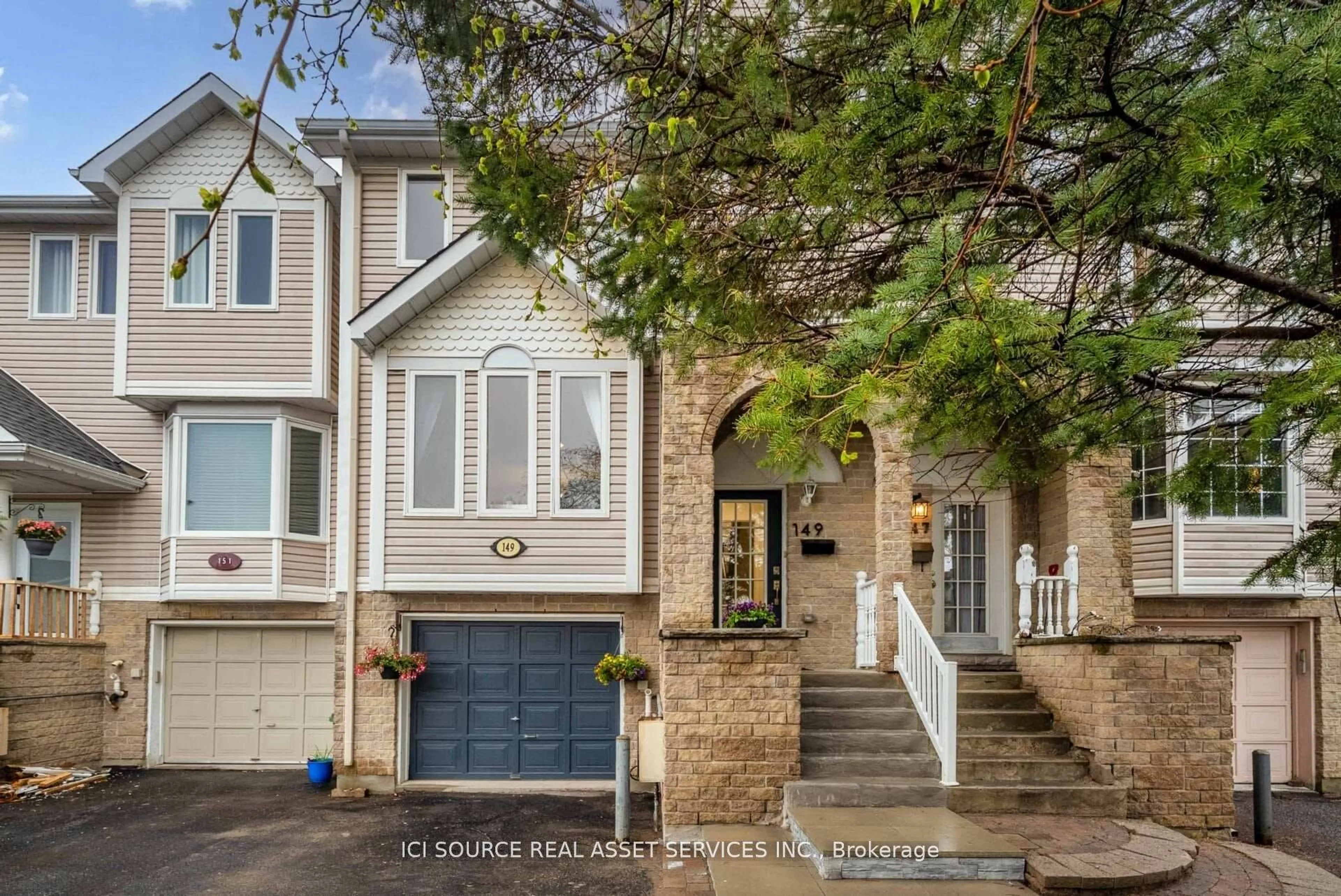 Home with brick exterior material, street for 149 Woodgate Way, Ottawa Ontario K2J 4E5