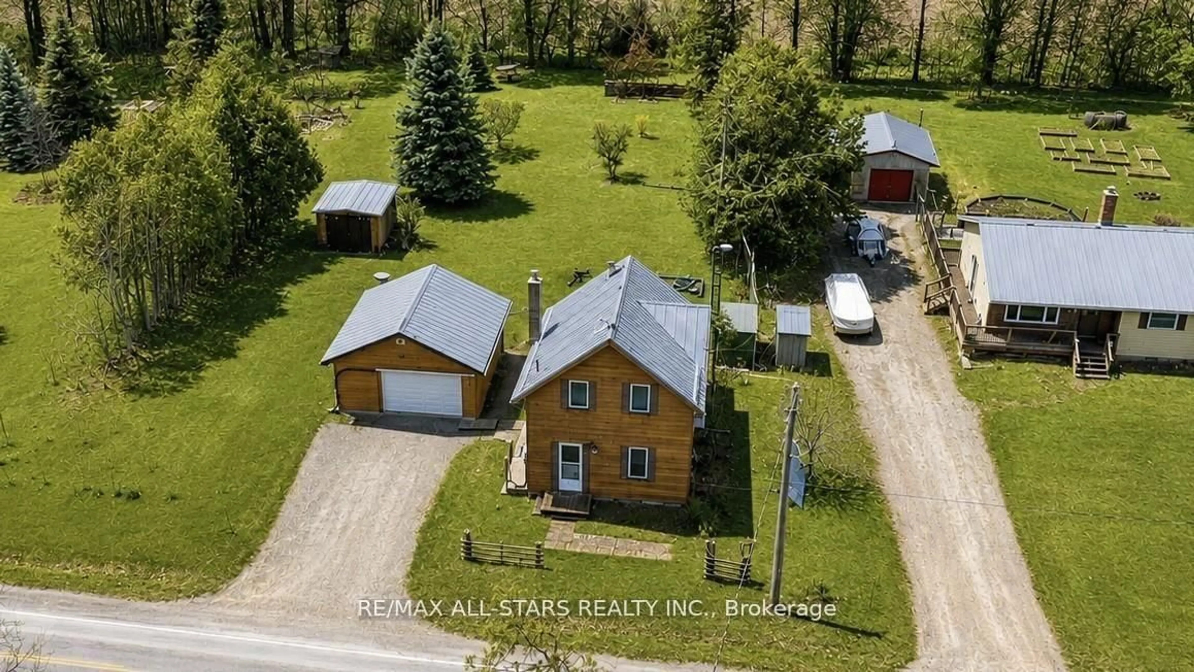 A pic from outside/outdoor area/front of a property/back of a property/a pic from drone, street for 534 Fenel Rd, Kawartha Lakes Ontario K0M 2T0