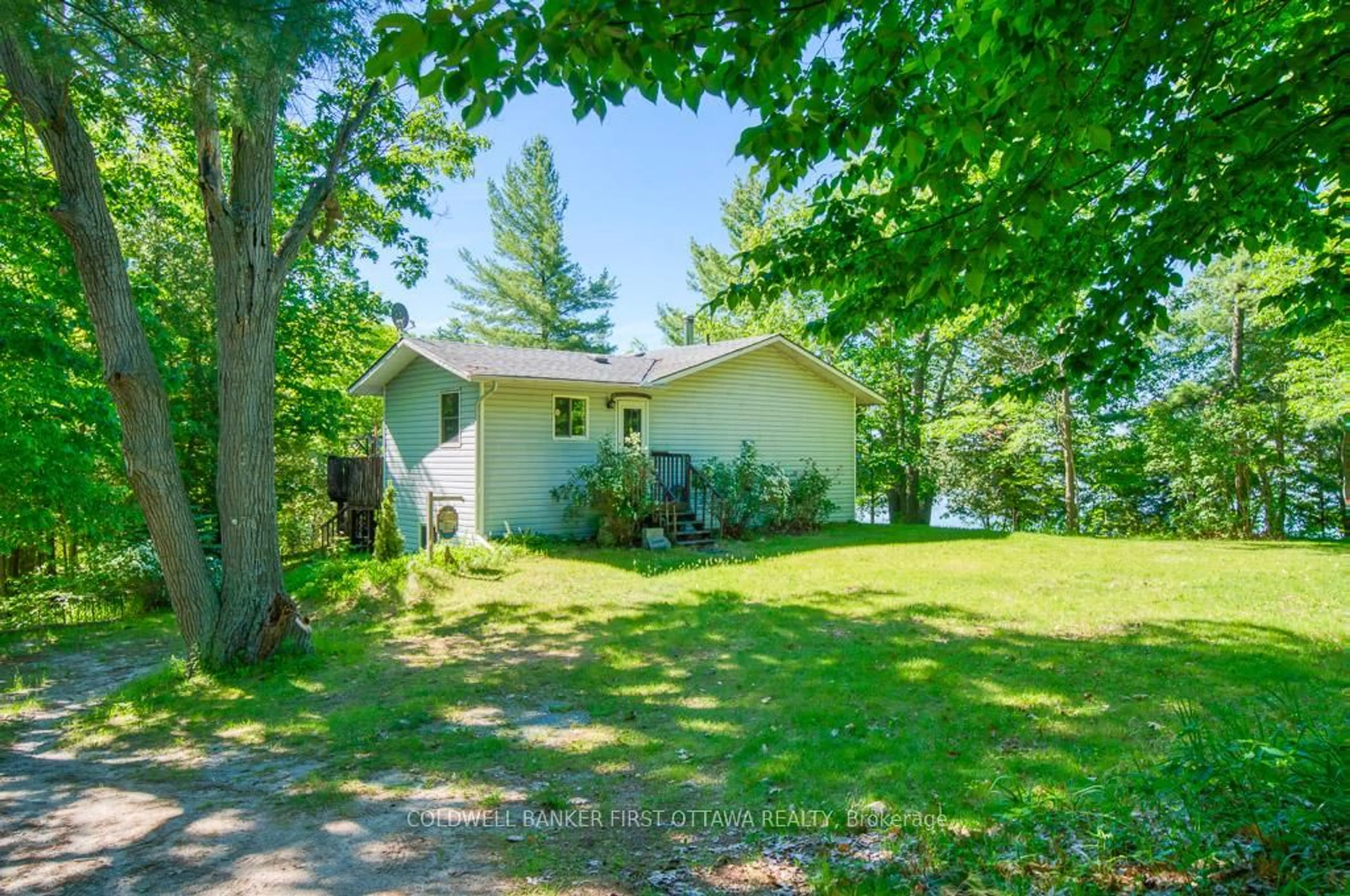 A pic from outside/outdoor area/front of a property/back of a property/a pic from drone, unknown for 1301 D Guigue Rd, Sharbot Lake Ontario K0H 2P0