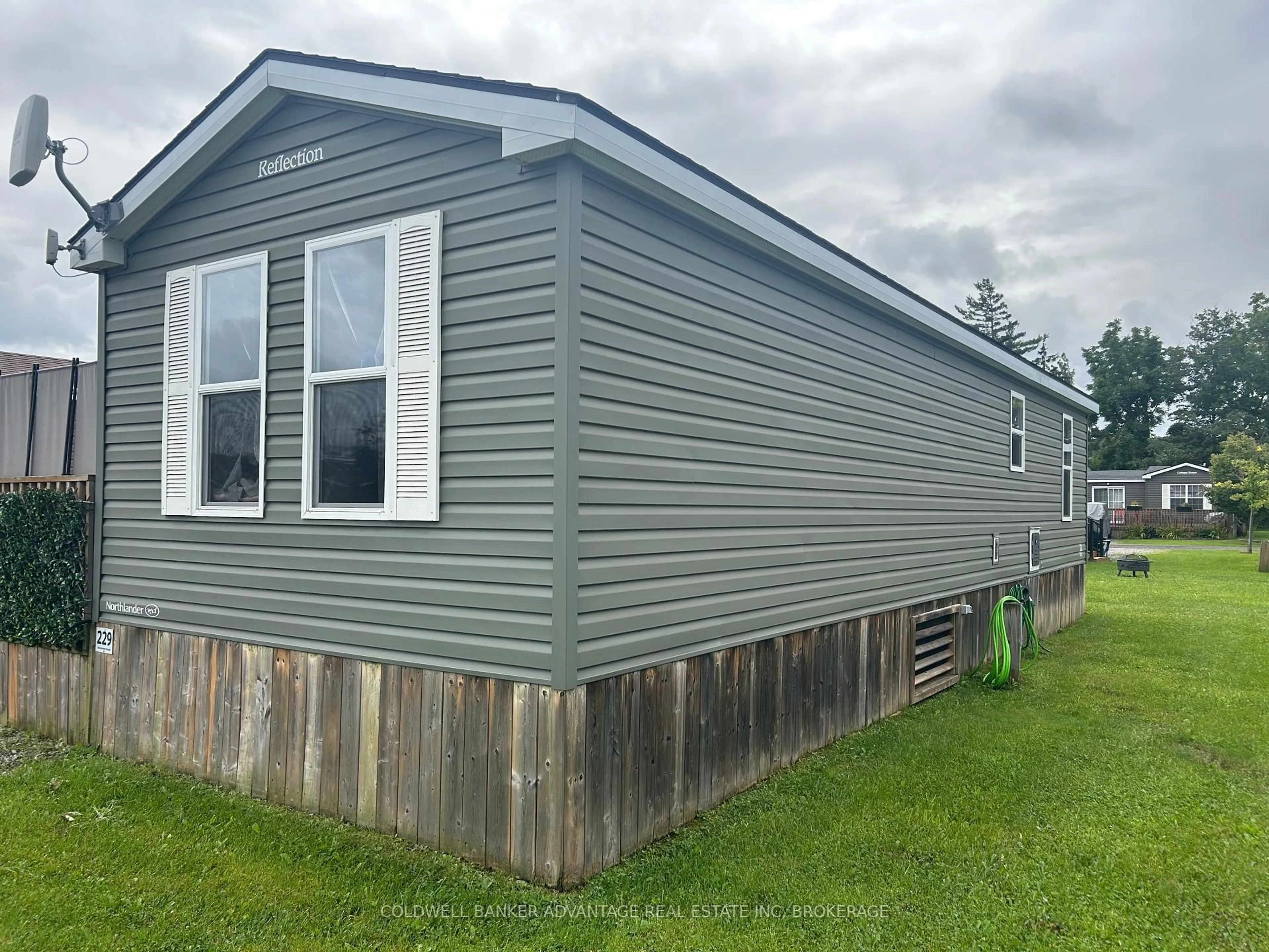 Home with vinyl exterior material, building for 1501 Line 8 Rd #229, Niagara-on-the-Lake Ontario L0S 1J0