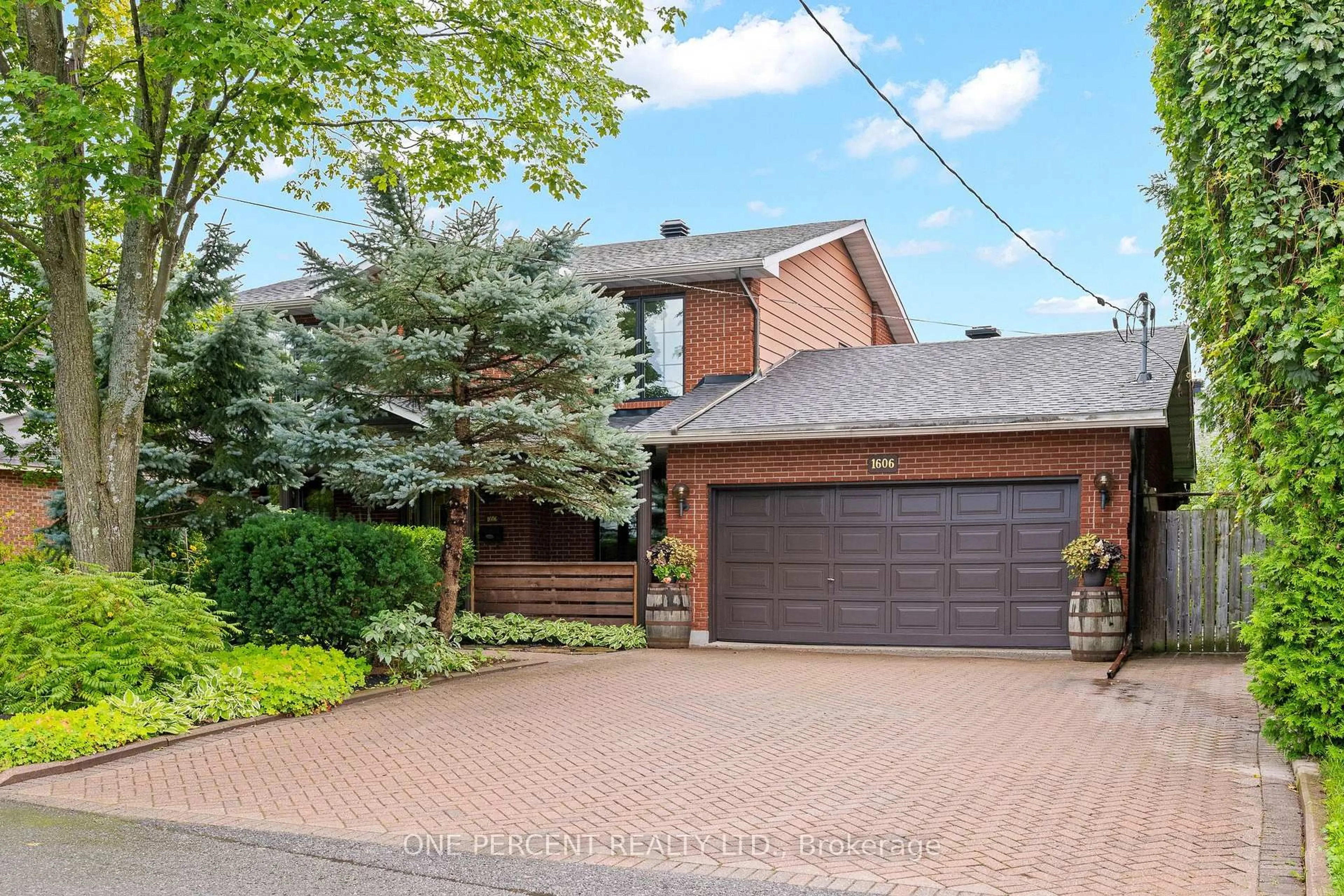 Home with brick exterior material, street for 1606 Ortona Ave, Ottawa Ontario K2C 1W5