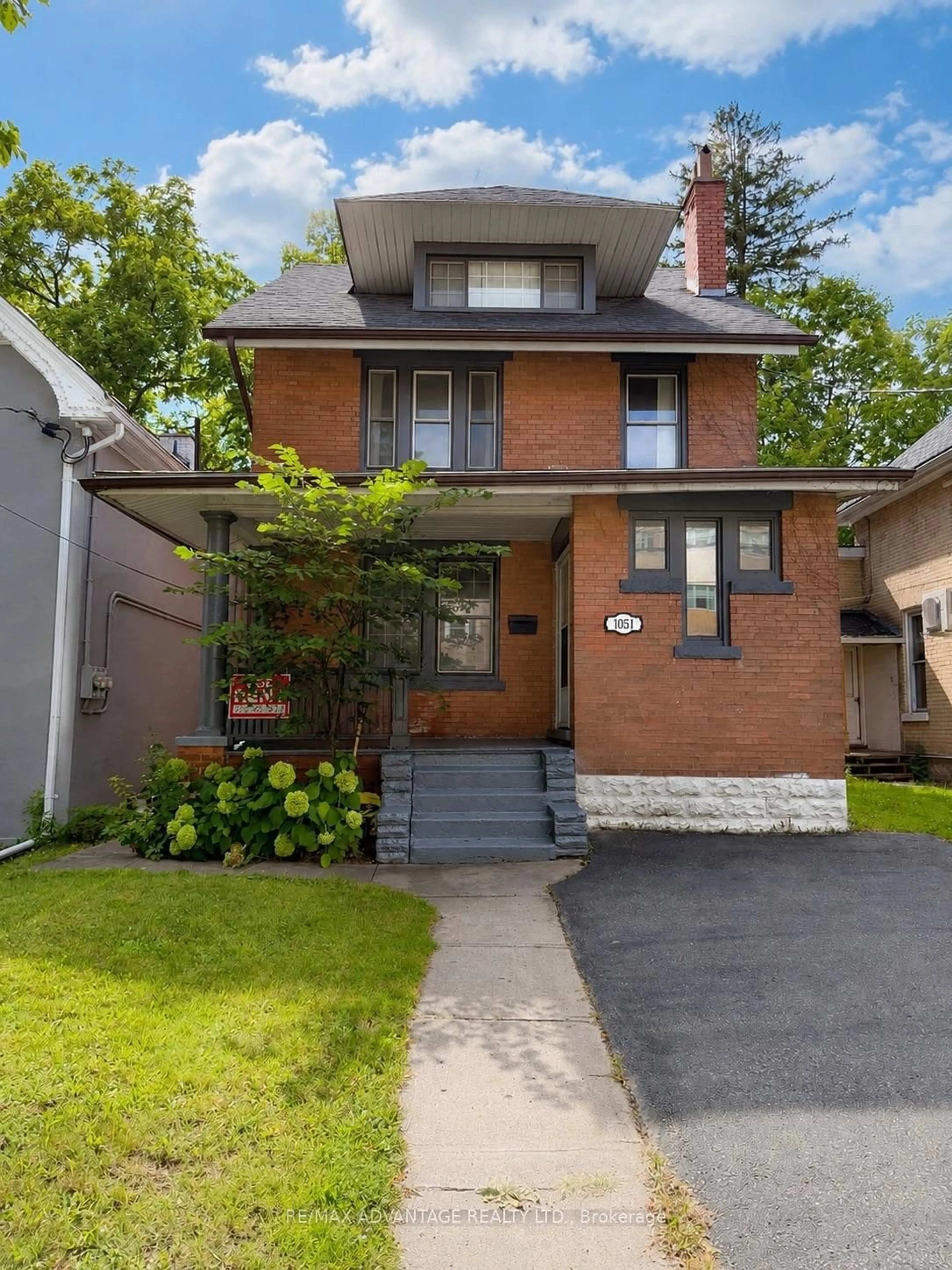 Home with brick exterior material, street for 1051 Richmond St, London East Ontario N6A 3J7