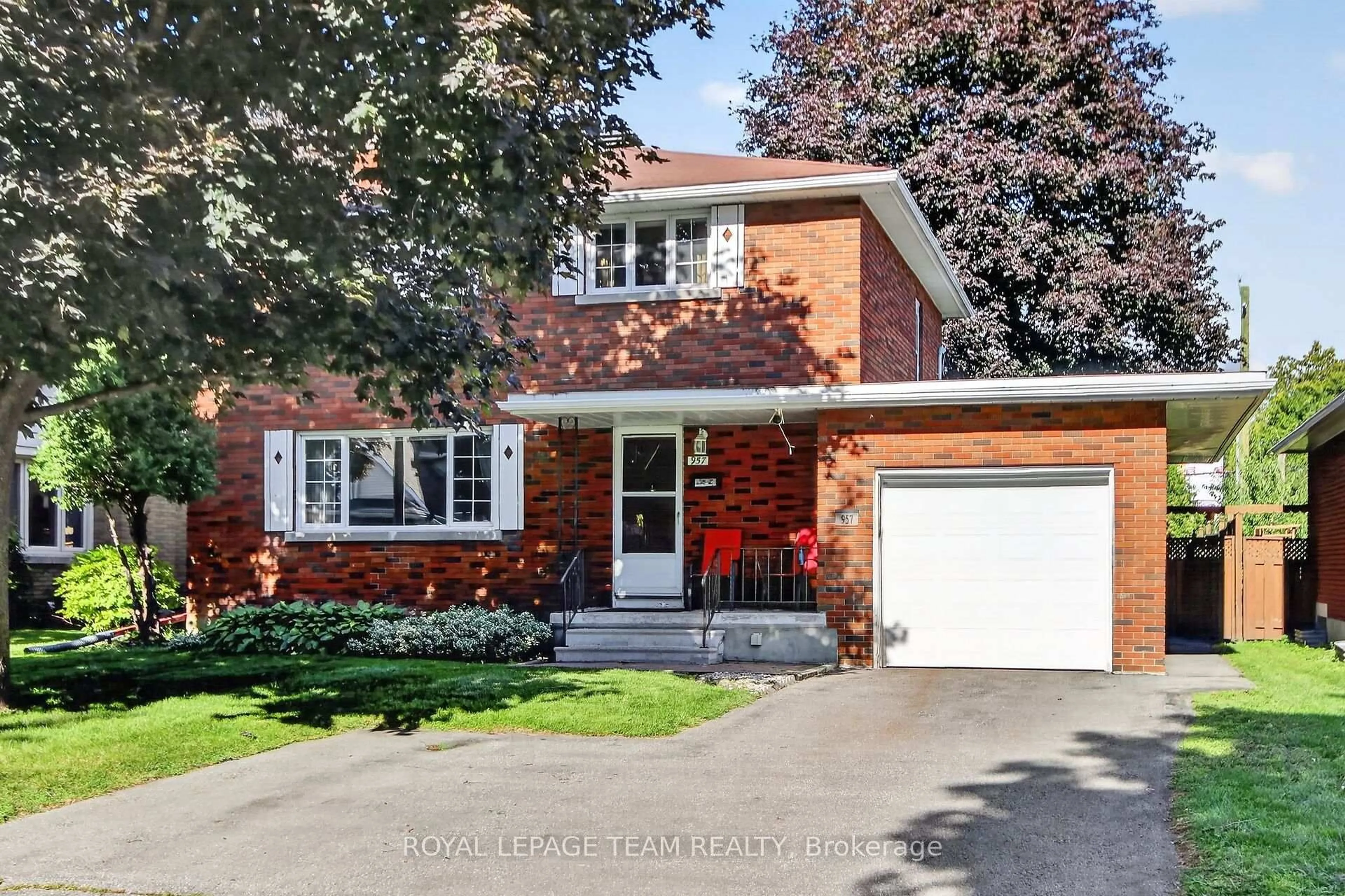 Home with brick exterior material, street for 957 Winnington Ave, Ottawa Ontario K2B 5C6