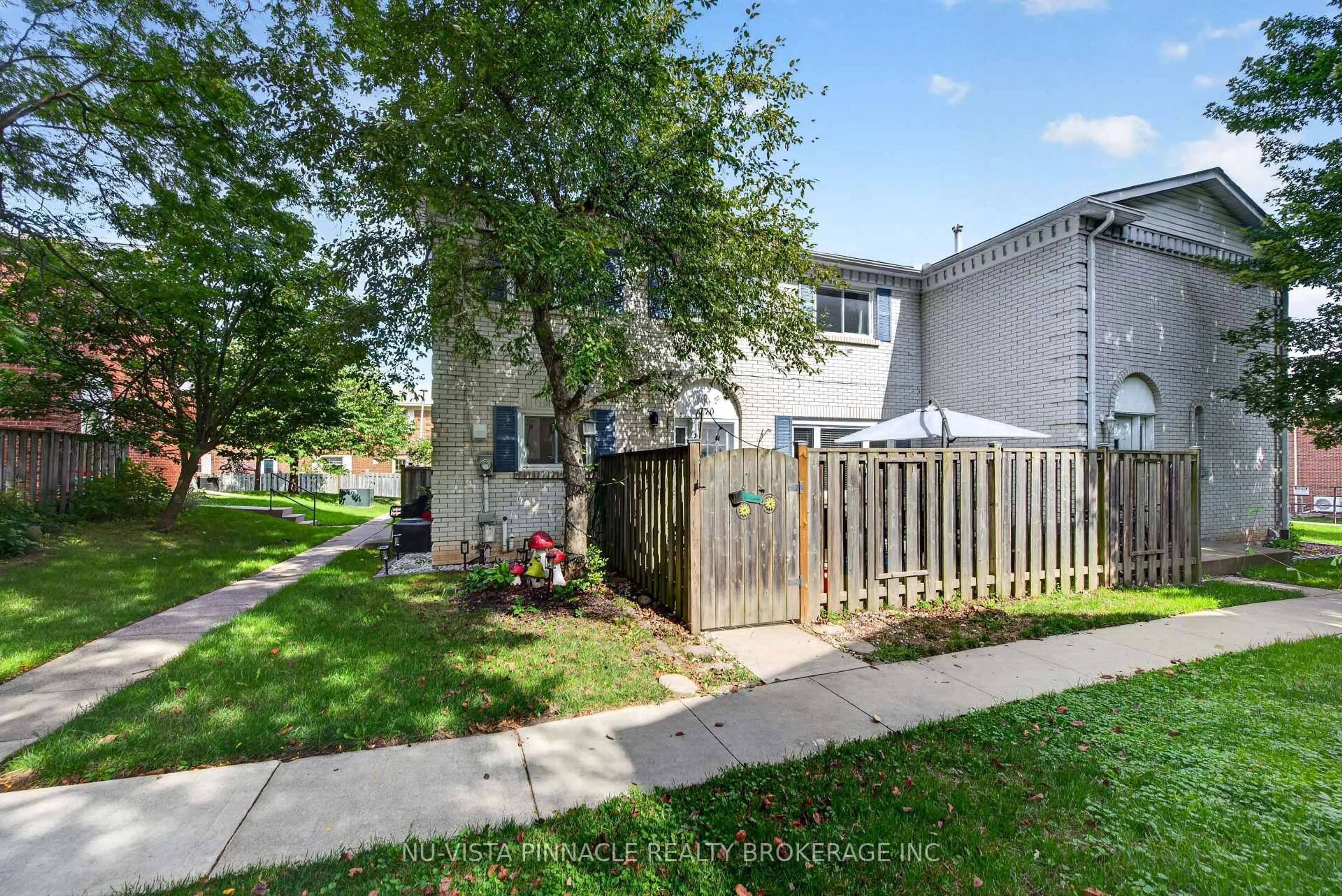 A pic from outside/outdoor area/front of a property/back of a property/a pic from drone, street for 370 Homestead Crt #13, London North Ontario N6G 2E9