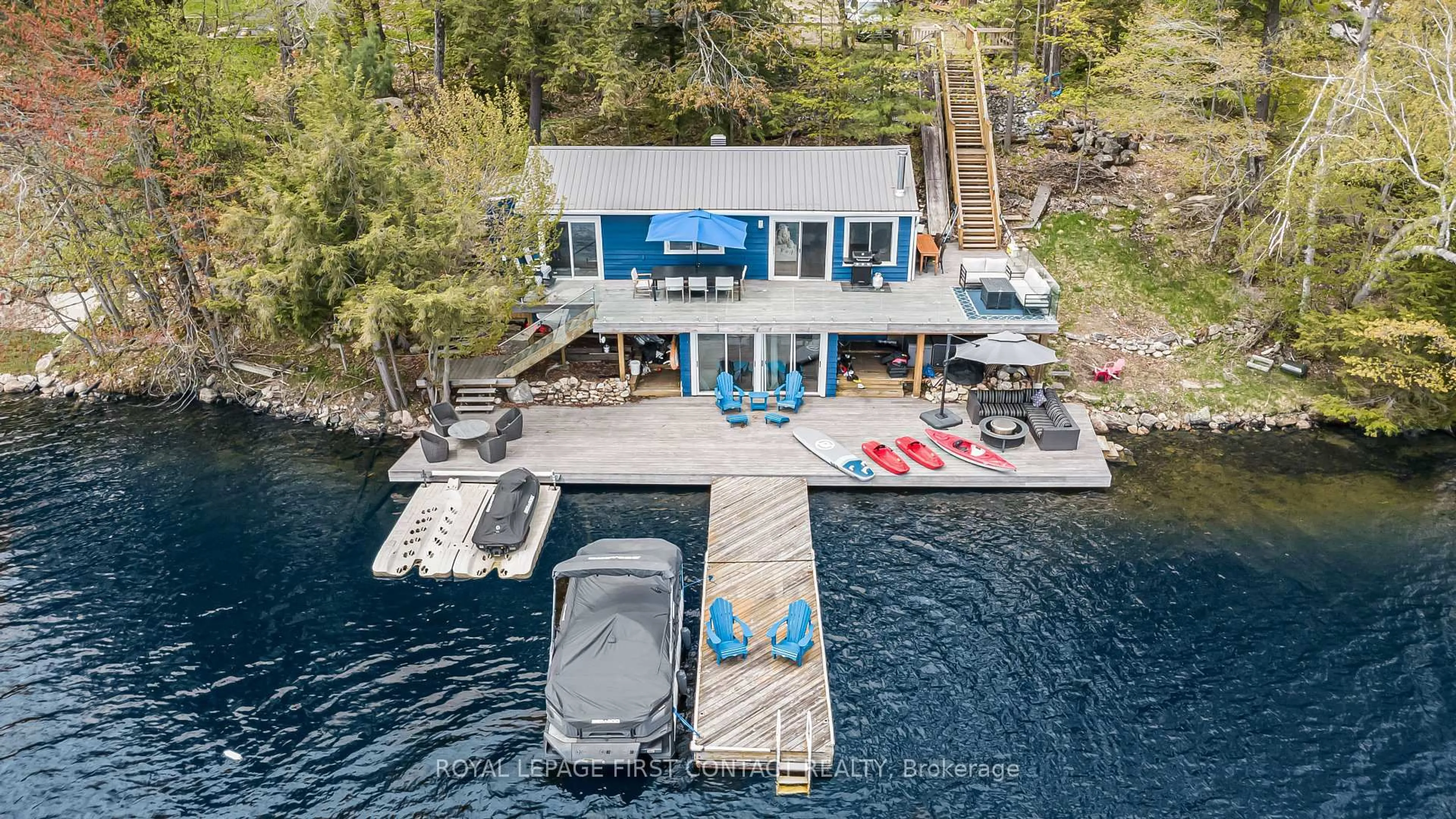 A pic from outside/outdoor area/front of a property/back of a property/a pic from drone, water/lake/river/ocean view for 57 Fox Back Rd, The Archipelago Ontario P0C 1H0
