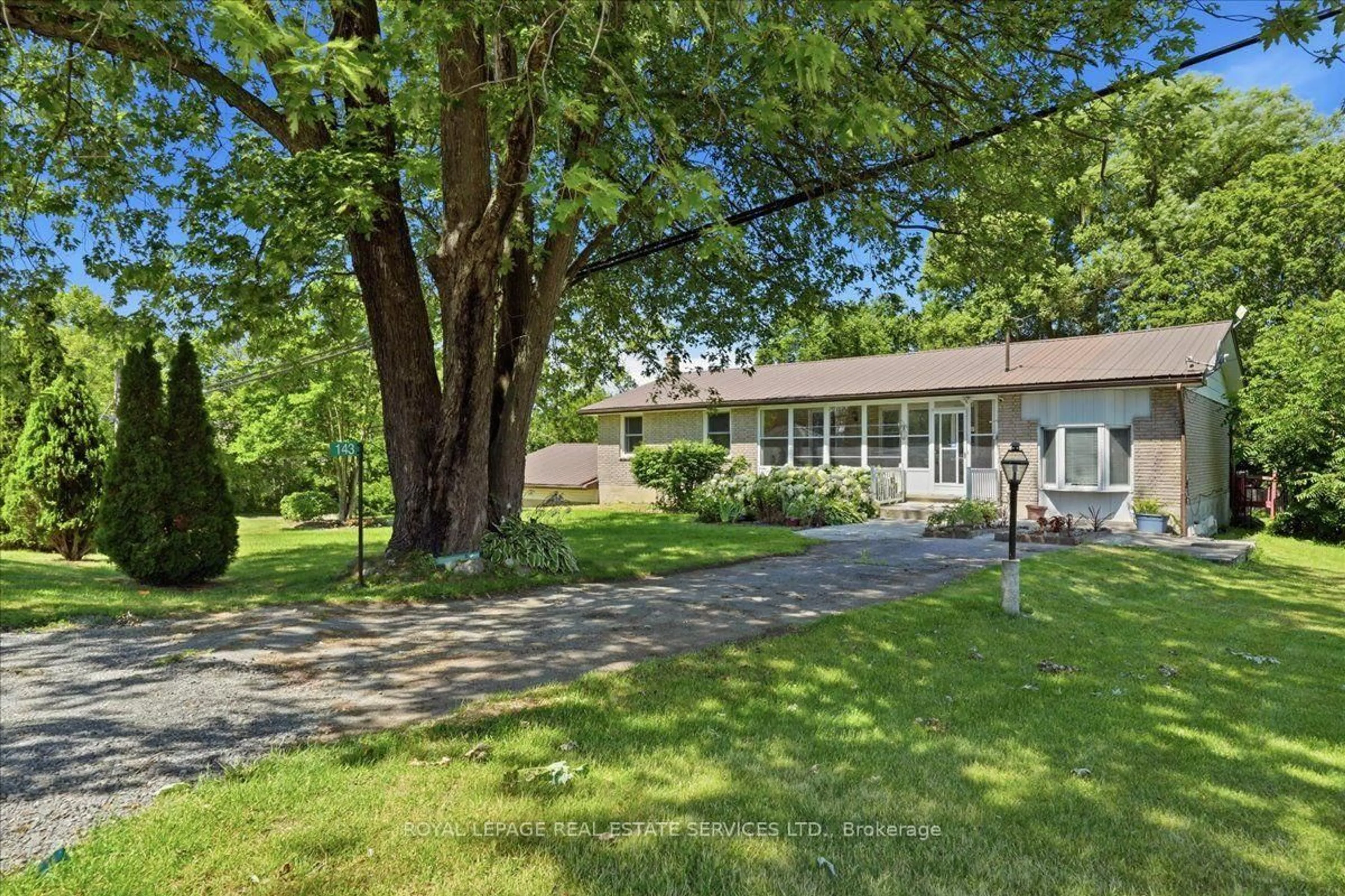 A pic from outside/outdoor area/front of a property/back of a property/a pic from drone, street for 143 County Rd 28 Rd, Prince Edward County Ontario K8N 4Z7