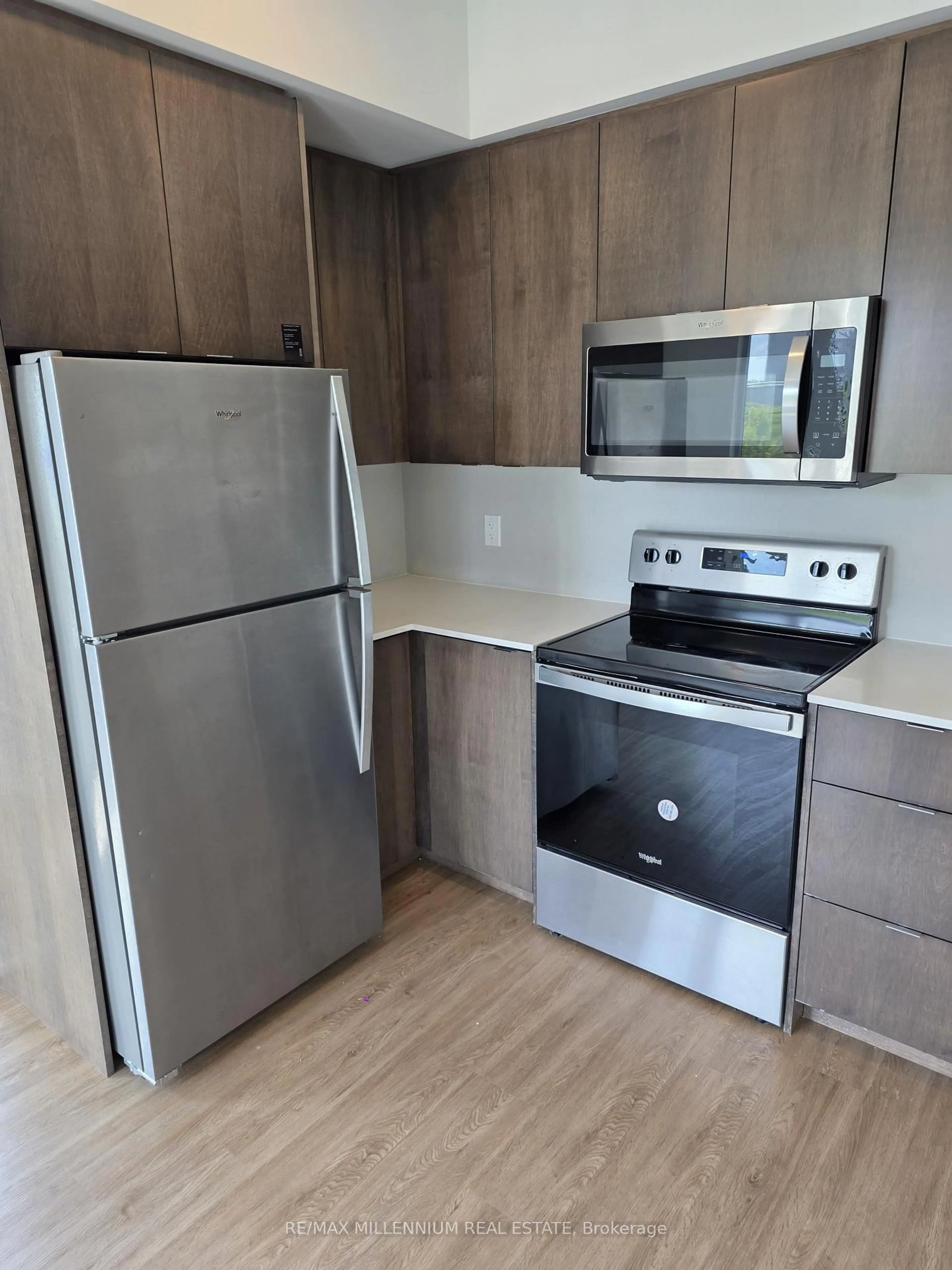 Standard kitchen, wood/laminate floor for 708 Woolwich St #121, Guelph Ontario N1H 0C8