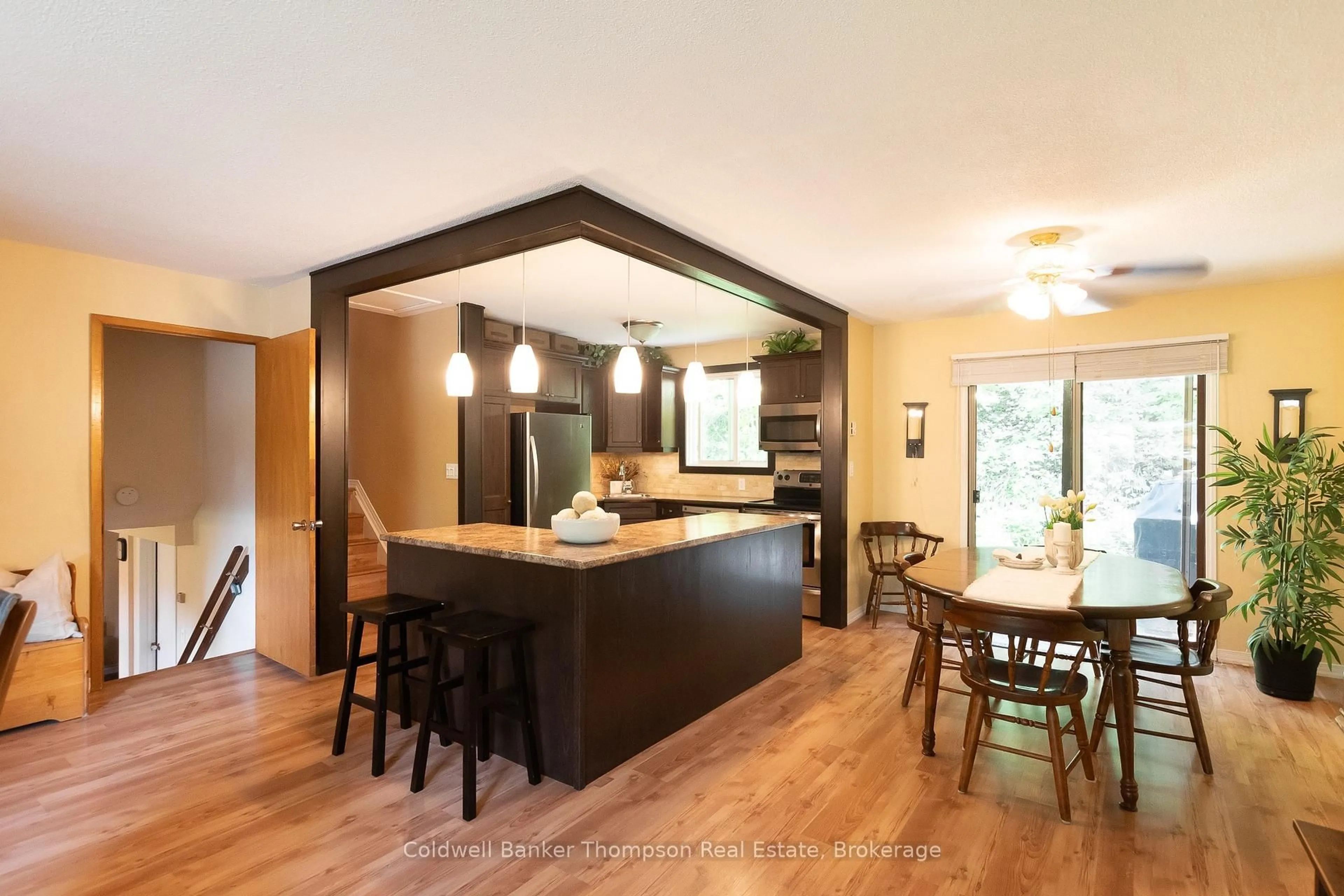 Open concept kitchen, wood/laminate floor for 151 Main St, Huntsville Ontario P1H 1X8