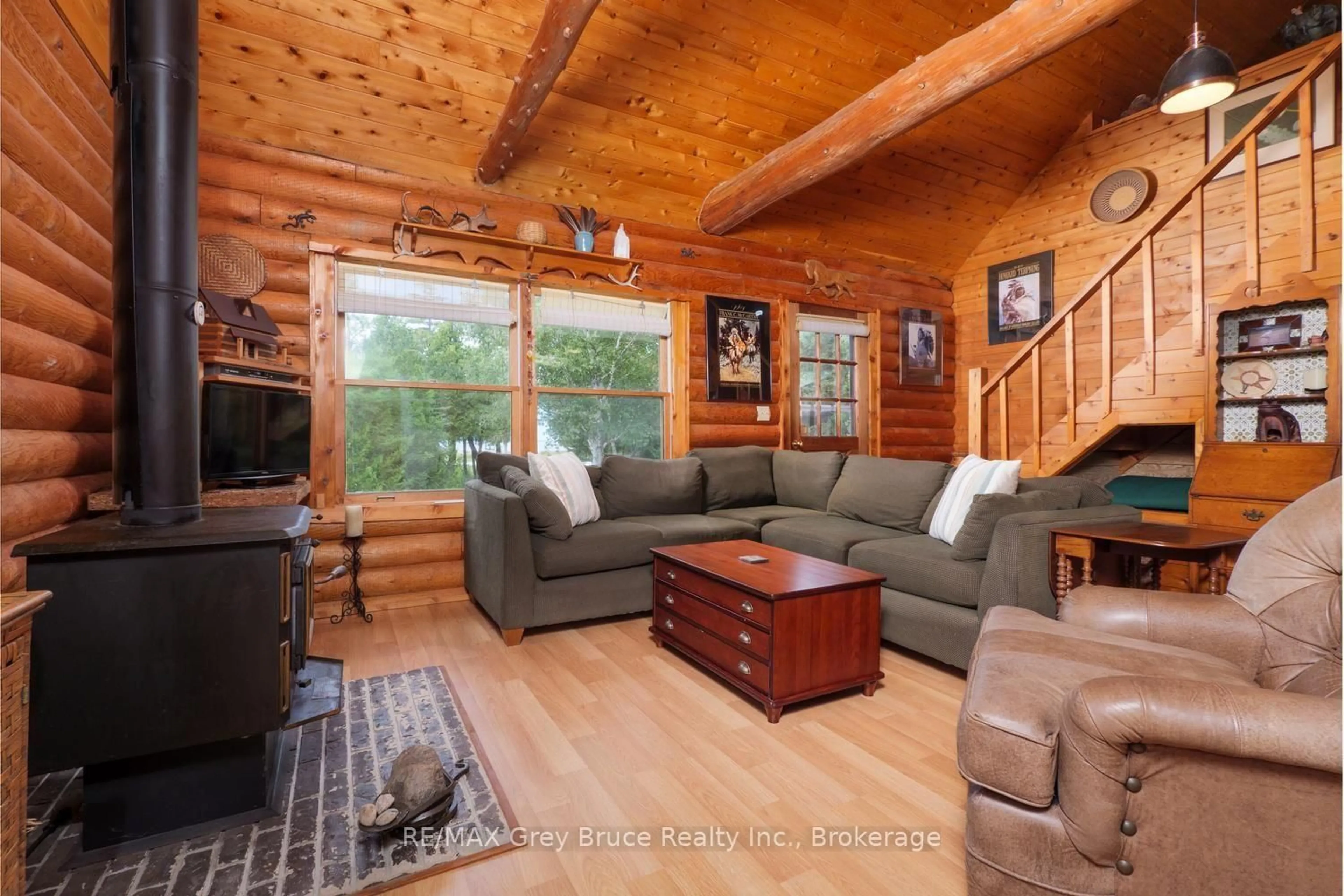 Living room with furniture, wood/laminate floor for 281 Shoreline Ave, South Bruce Peninsula Ontario N0H 2T0