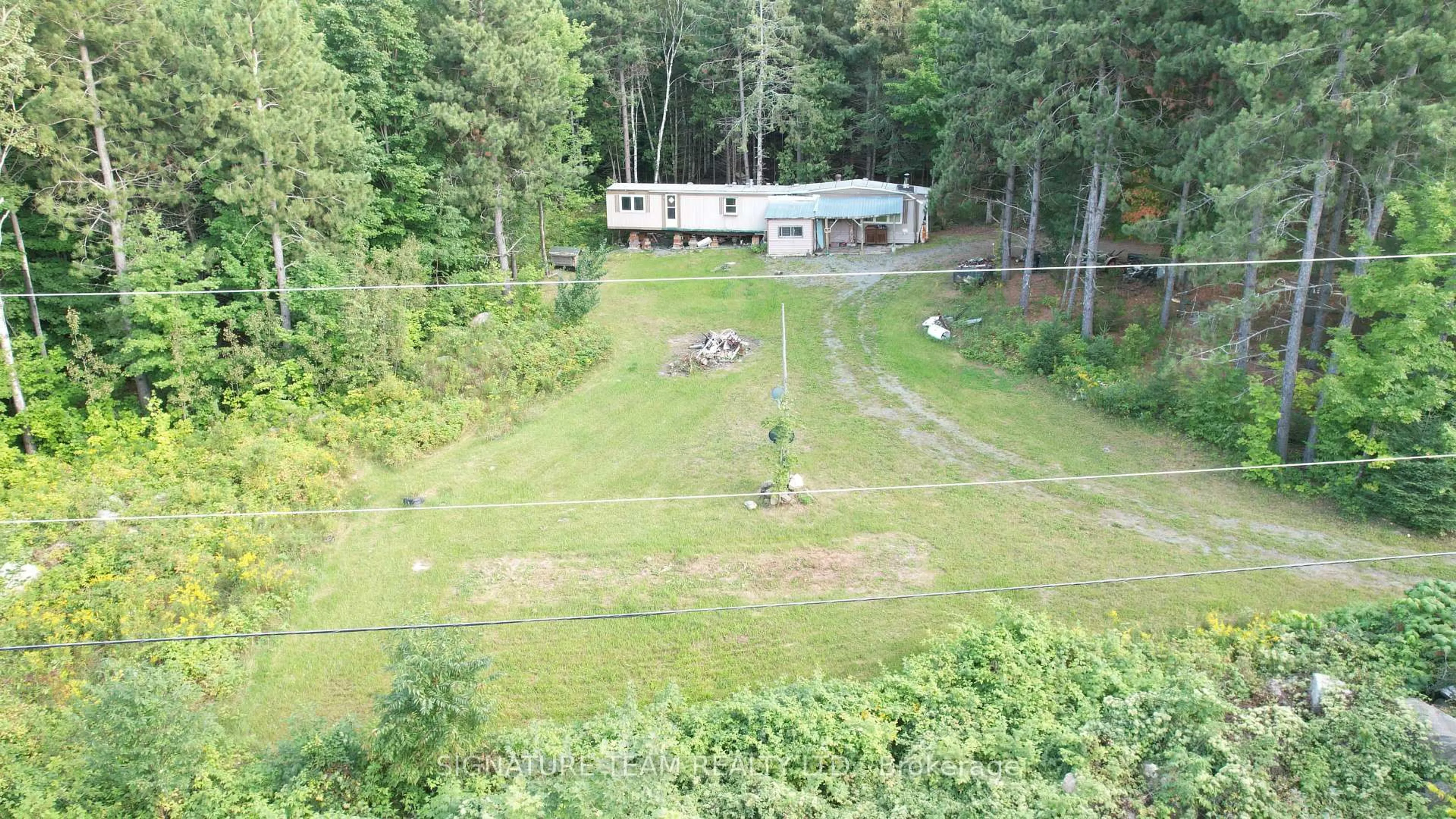 A pic from outside/outdoor area/front of a property/back of a property/a pic from drone, forest/trees view for 3155 Mountain View Rd, Killaloe Ontario K0J 2A0