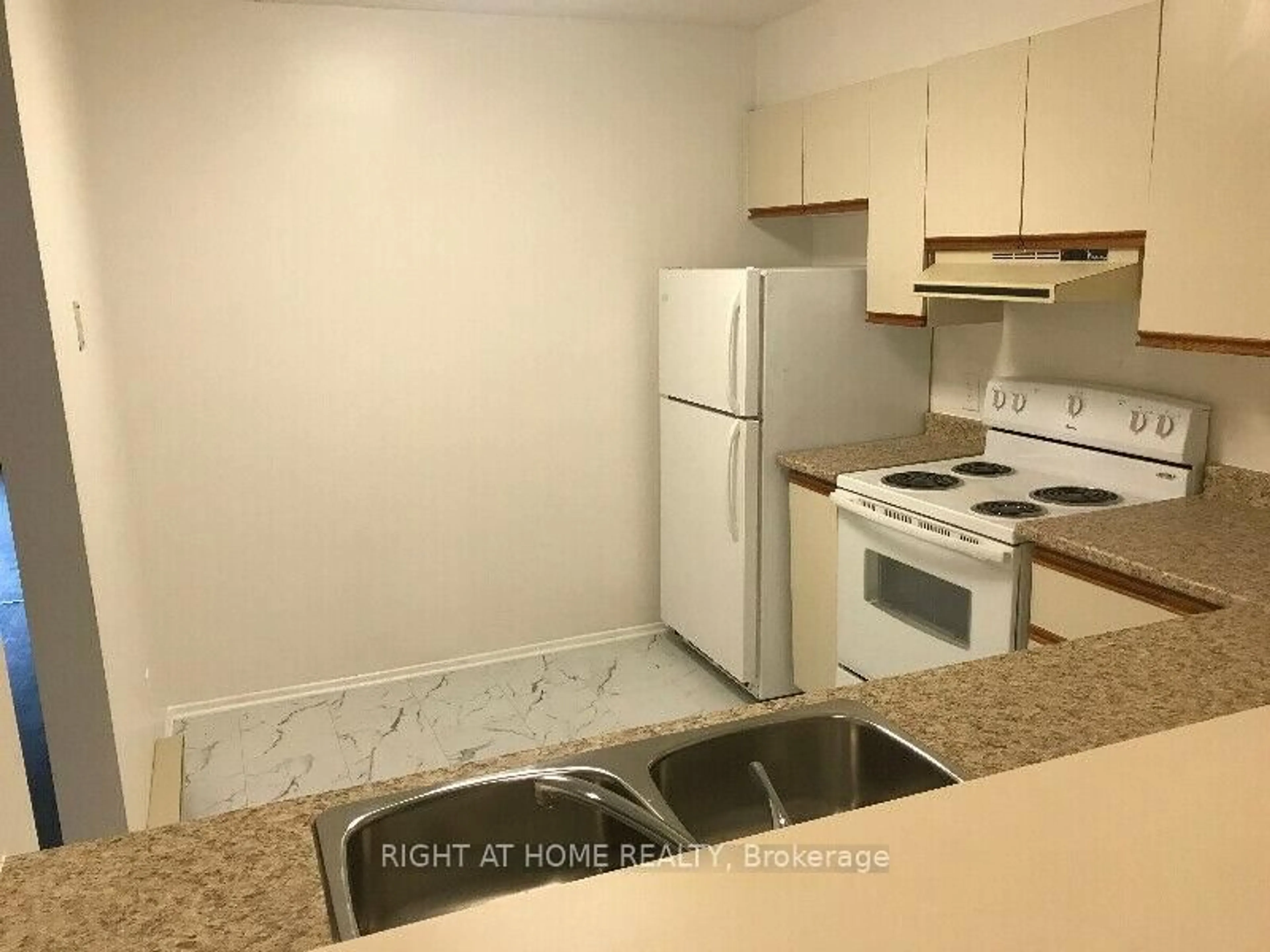 Standard kitchen, floor is not visible for 1035 Cummings Ave #B, Ottawa Ontario K1J 9K5