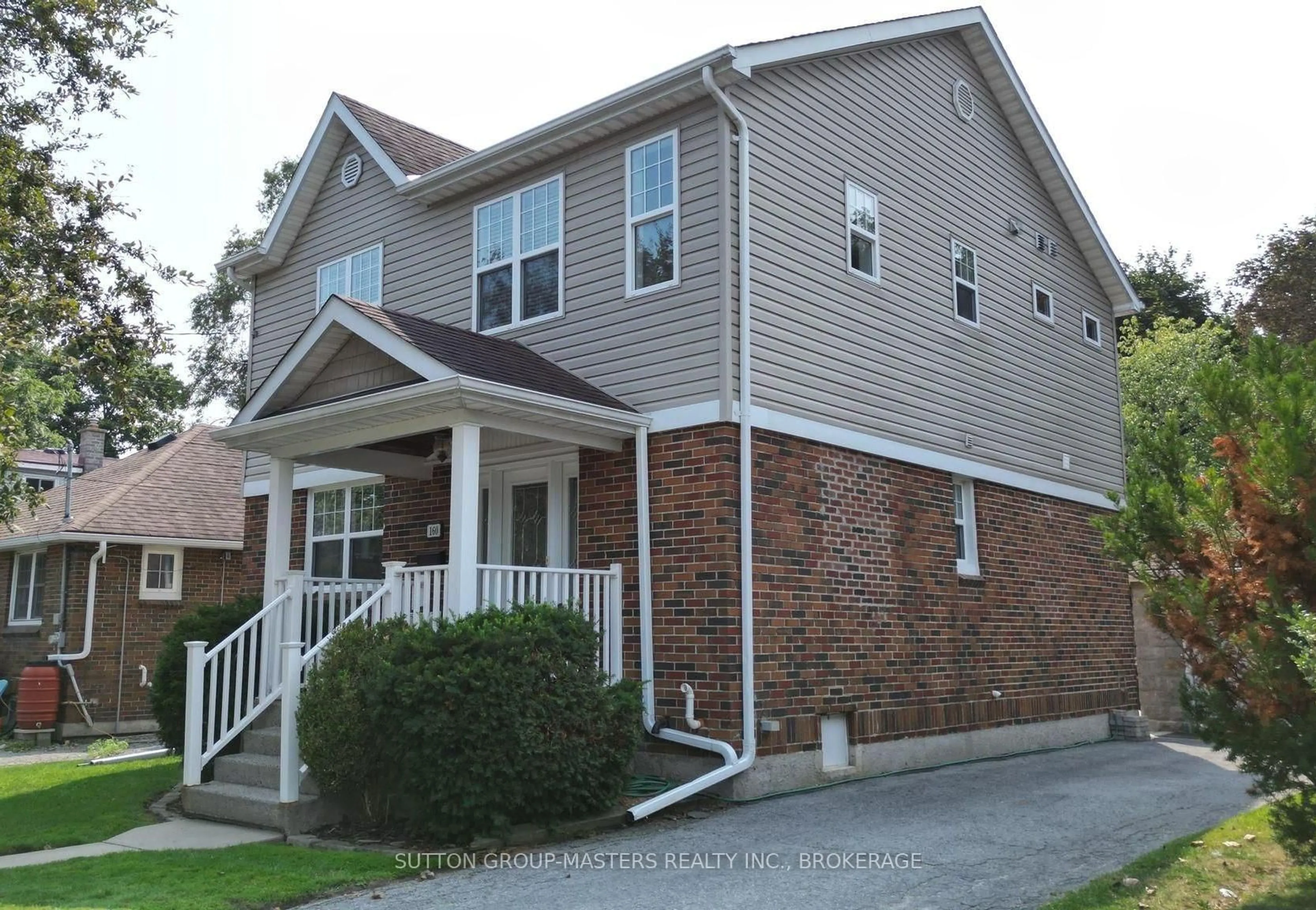 Home with vinyl exterior material, street for 160 Napier St, Kingston Ontario K7L 4G5