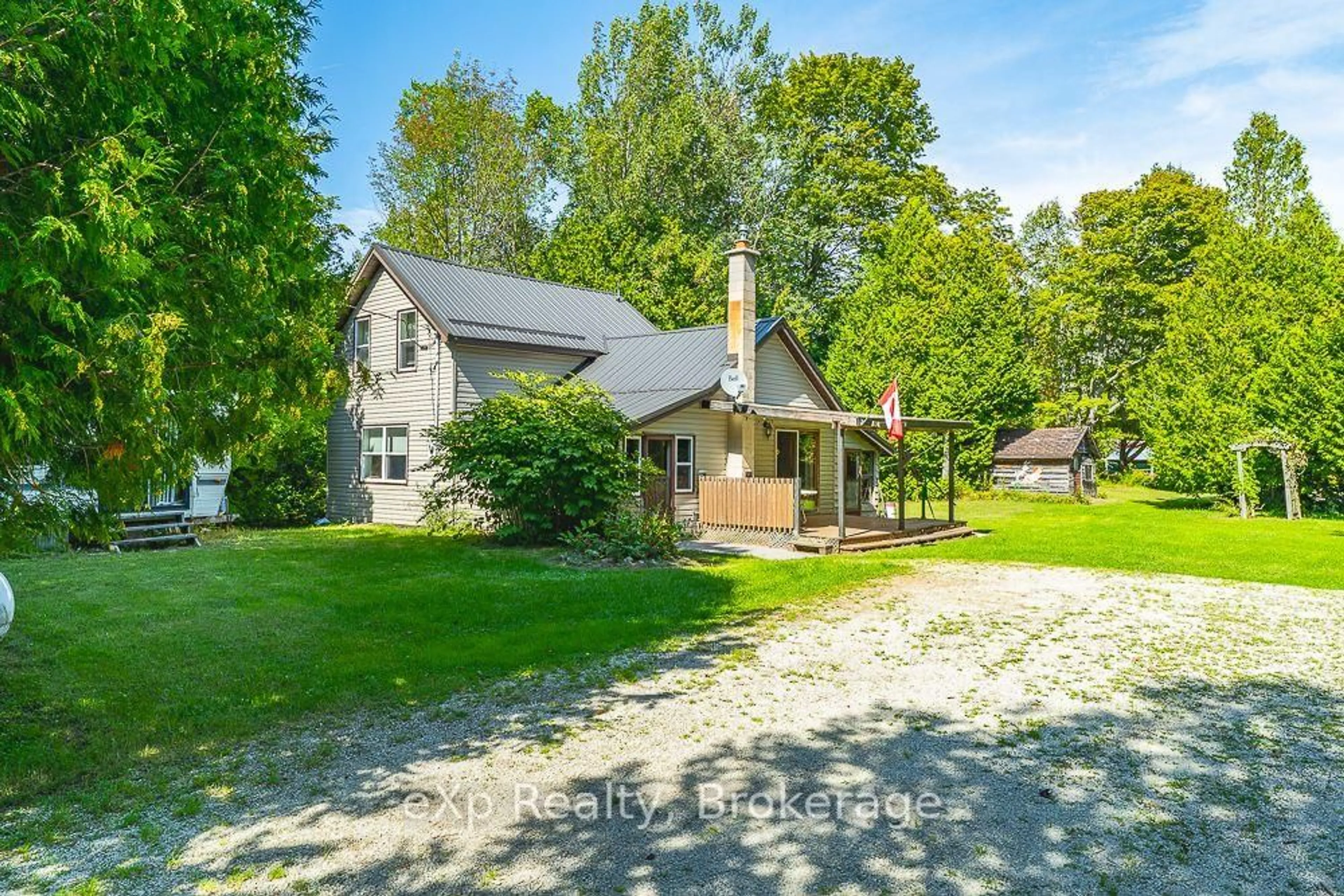 A pic from outside/outdoor area/front of a property/back of a property/a pic from drone, street for 520 Huron Rd, South Bruce Peninsula Ontario N0H 1X0