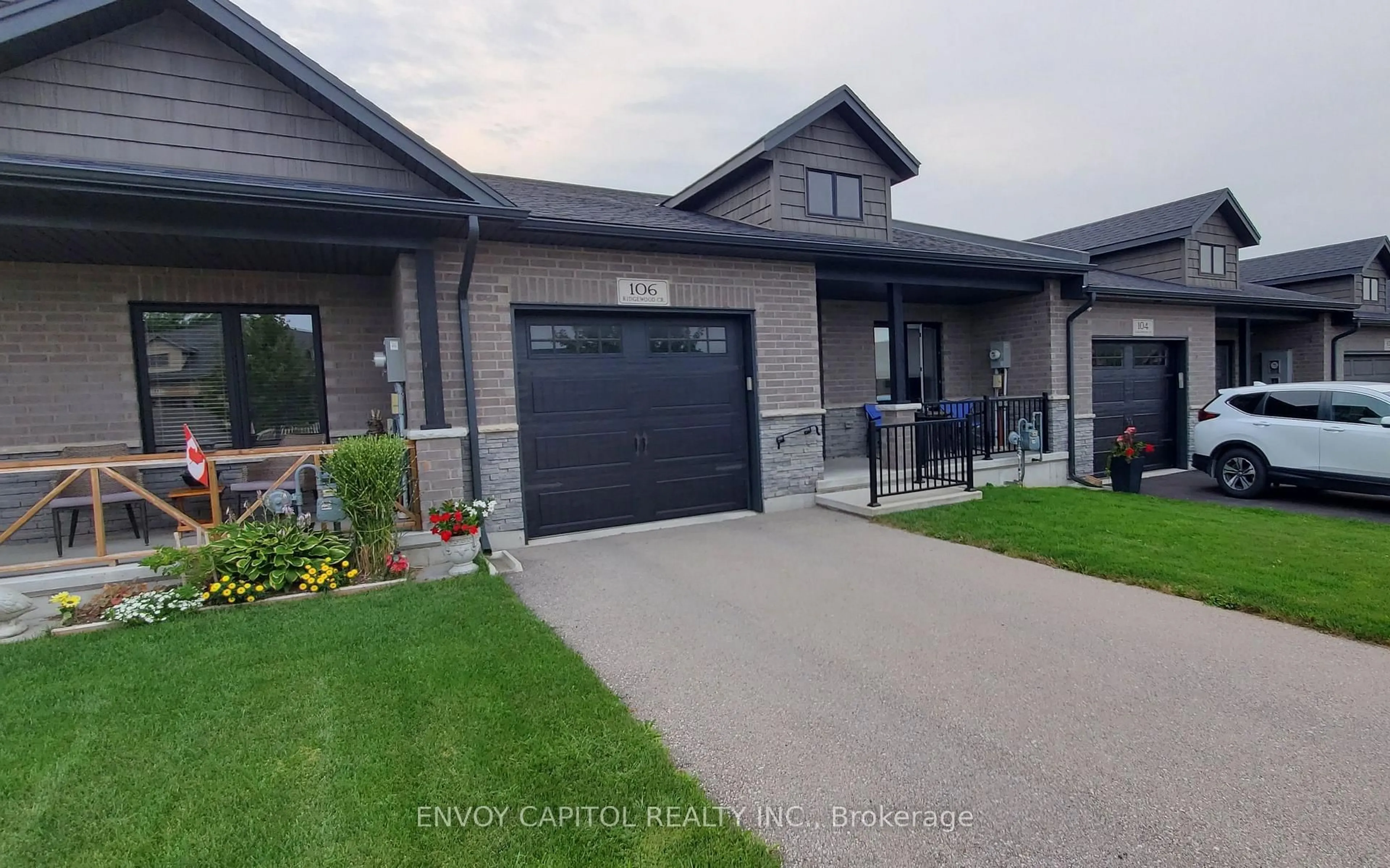 Home with brick exterior material, street for 106 Ridgewood Cres, St. Marys Ontario N4X 1E8