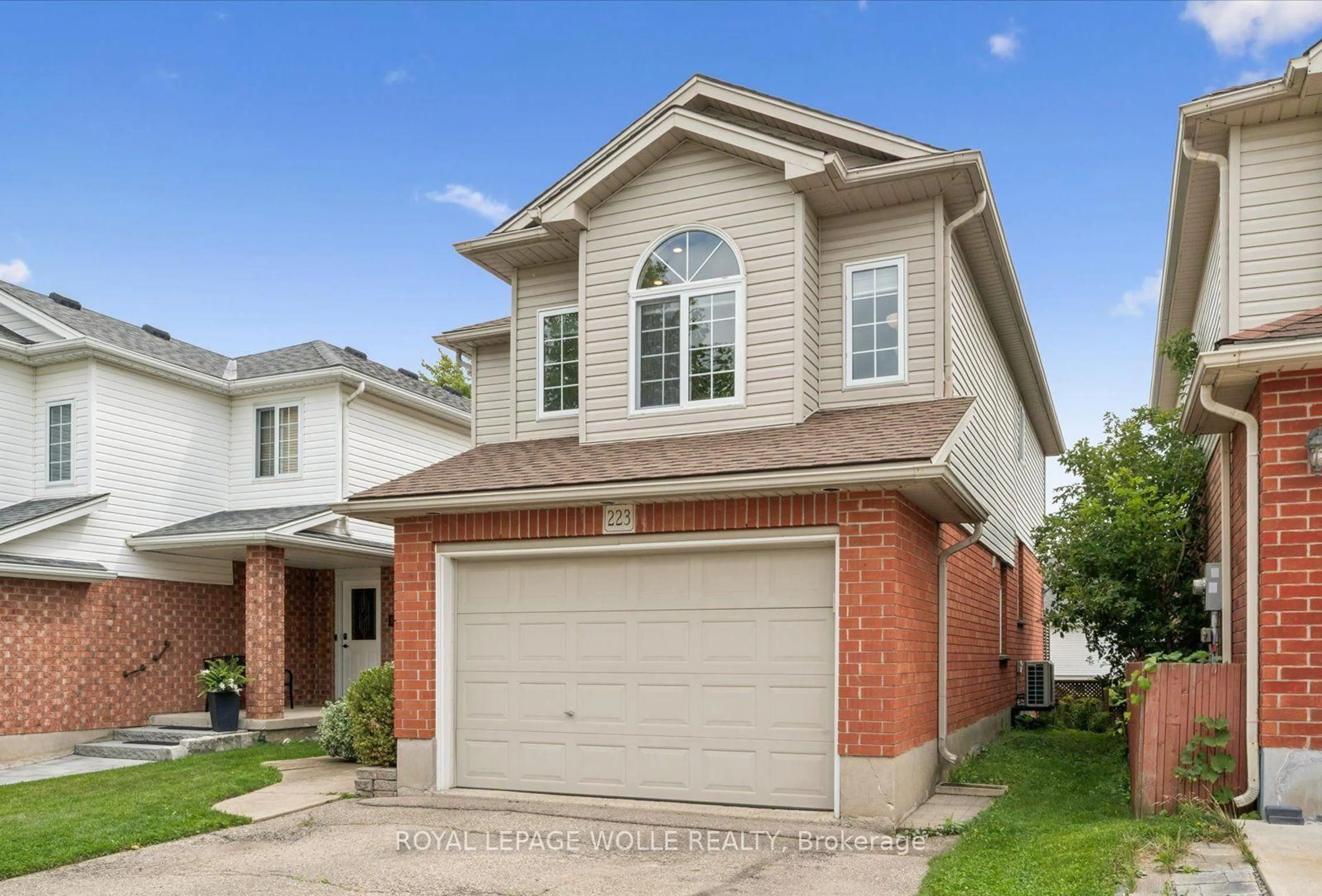 Home with brick exterior material, street for 223 Hollyridge Cres, Kitchener Ontario N2N 3N3