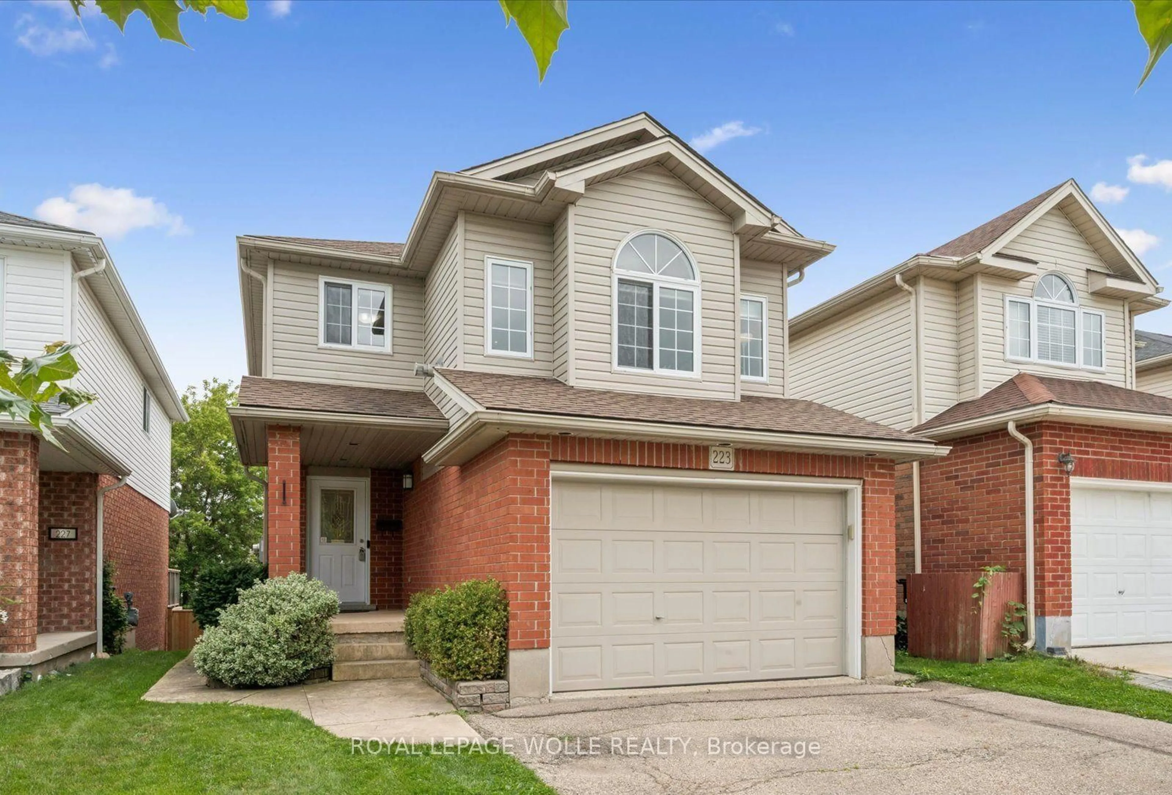 Home with brick exterior material, street for 223 Hollyridge Cres, Kitchener Ontario N2N 3N3