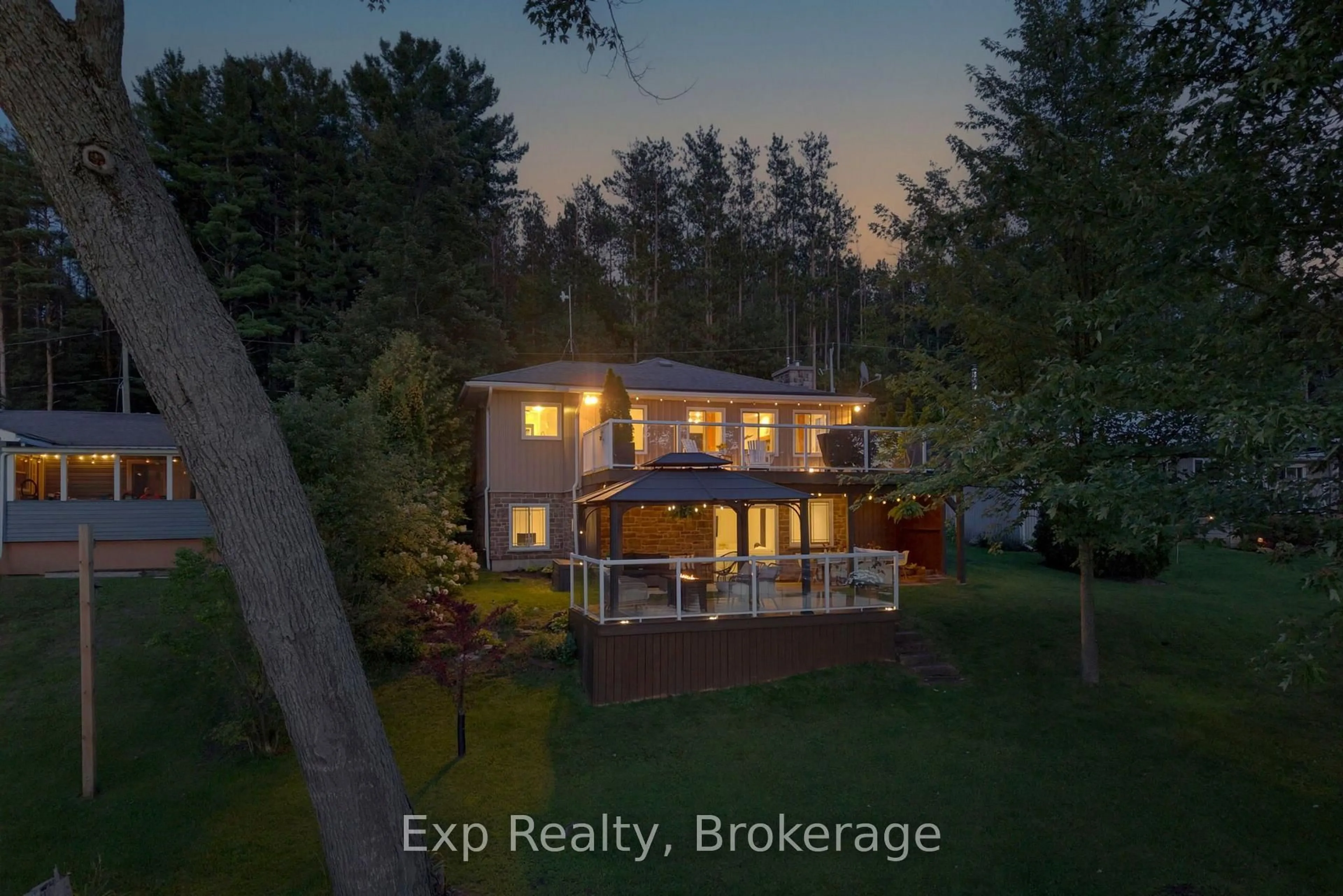 A pic from outside/outdoor area/front of a property/back of a property/a pic from drone, water/lake/river/ocean view for 90 Cosy Cove Lane, Tweed Ontario K0K 3J0