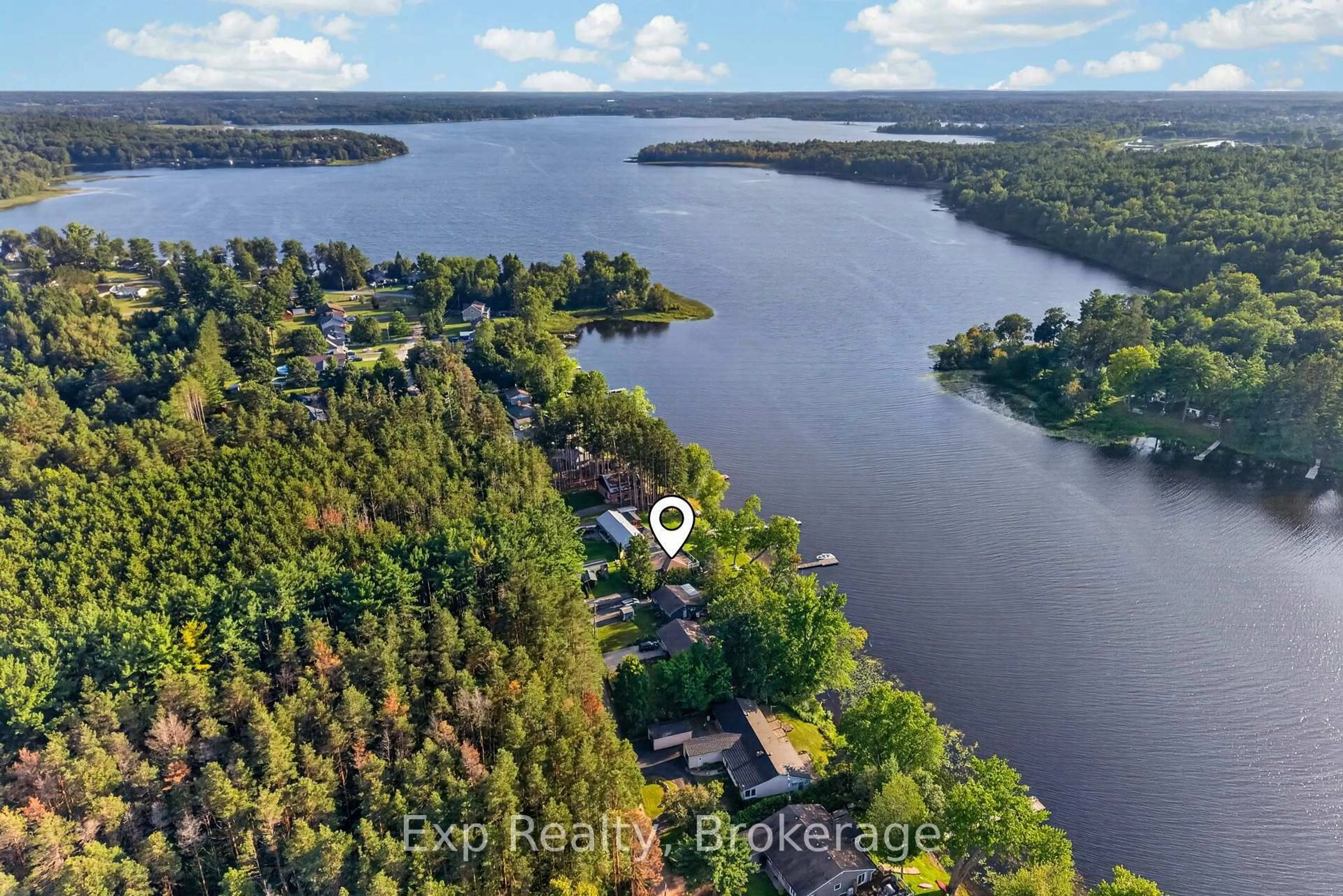 A pic from outside/outdoor area/front of a property/back of a property/a pic from drone, water/lake/river/ocean view for 90 Cosy Cove Lane, Tweed Ontario K0K 3J0