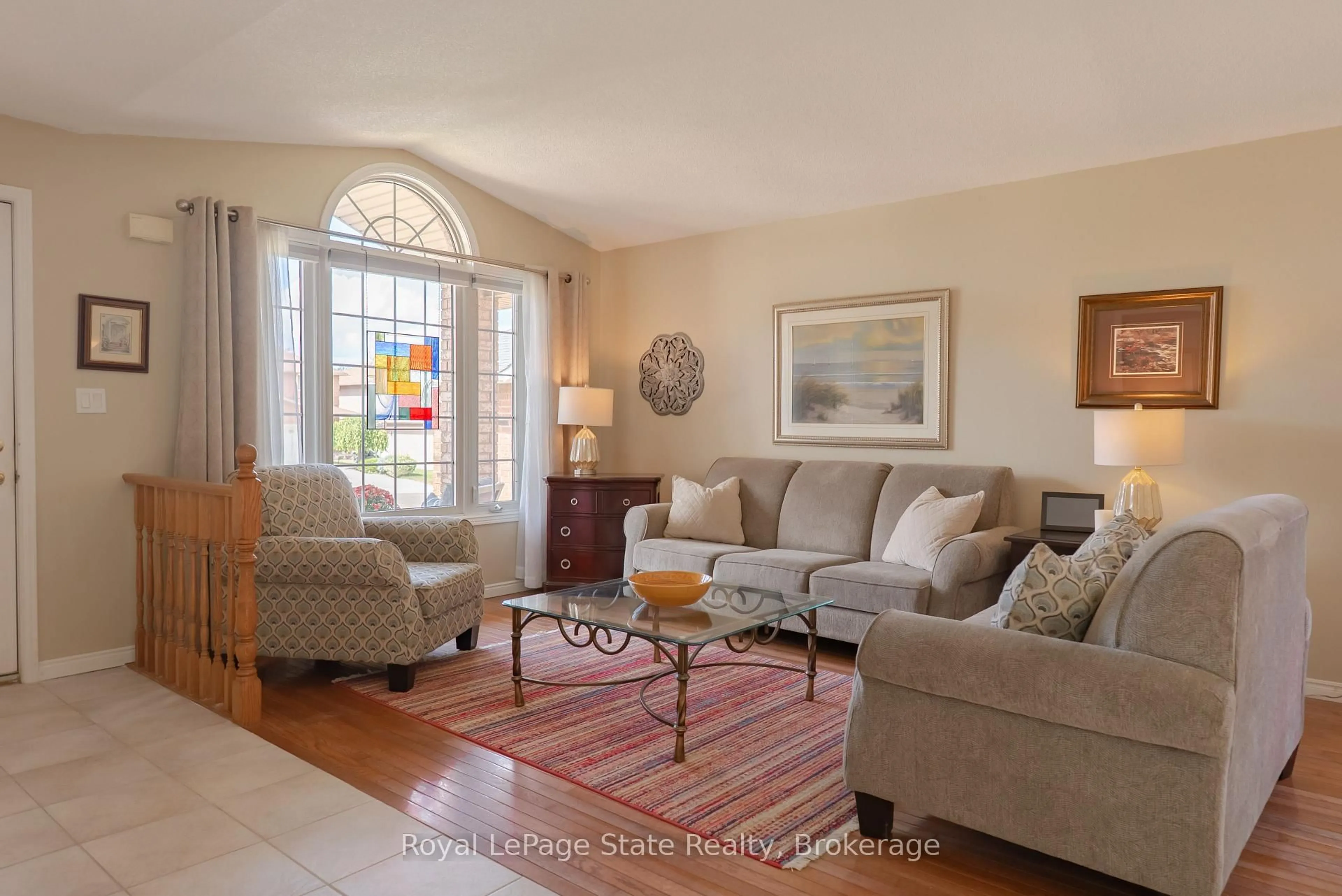 Living room with furniture, ceramic/tile floor for 54 Republic Ave, Hamilton Ontario L9B 2G7