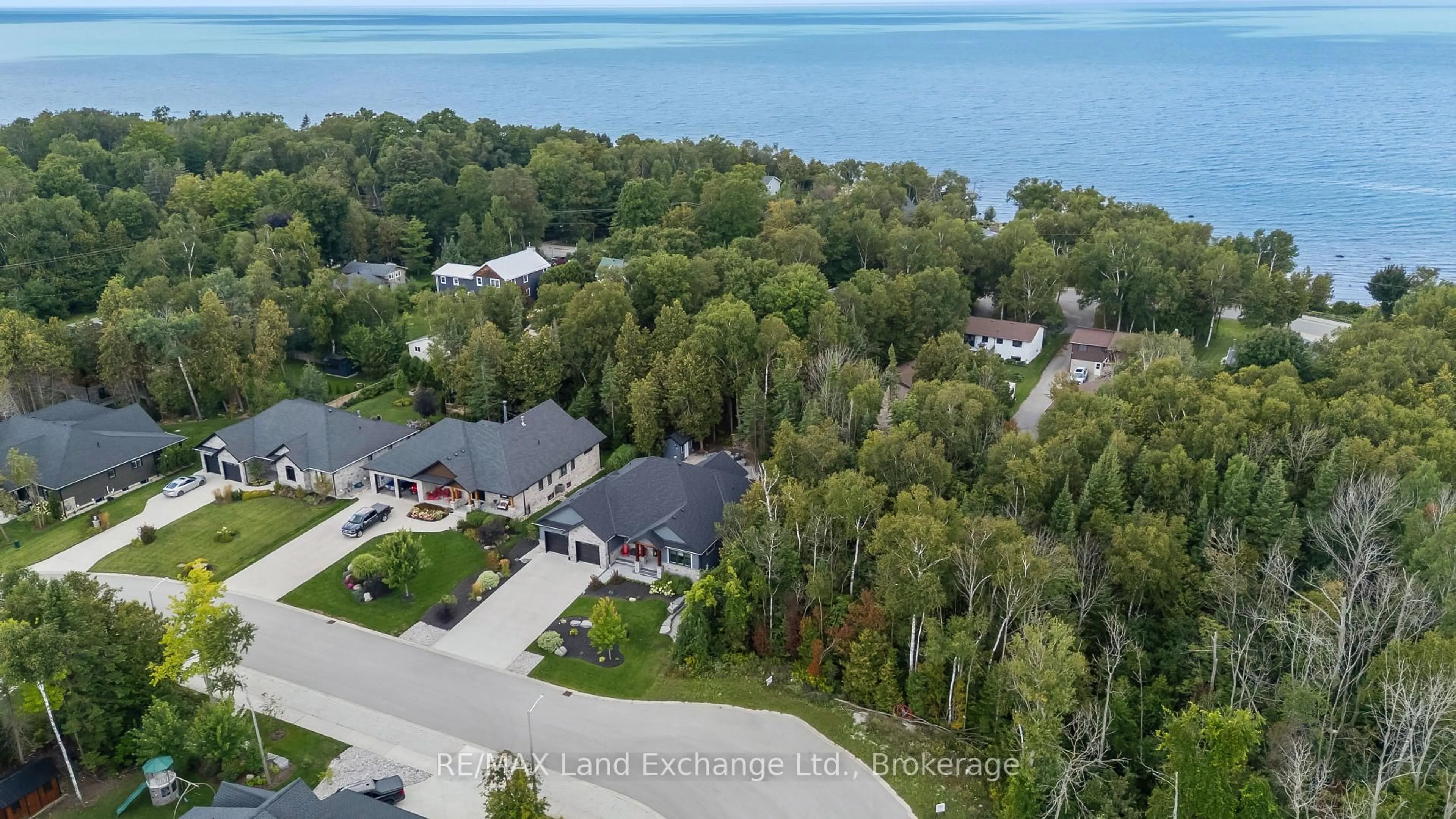 A pic from outside/outdoor area/front of a property/back of a property/a pic from drone, water/lake/river/ocean view for 9 Lakeside Woods Cres, Saugeen Shores Ontario N0H 2C6