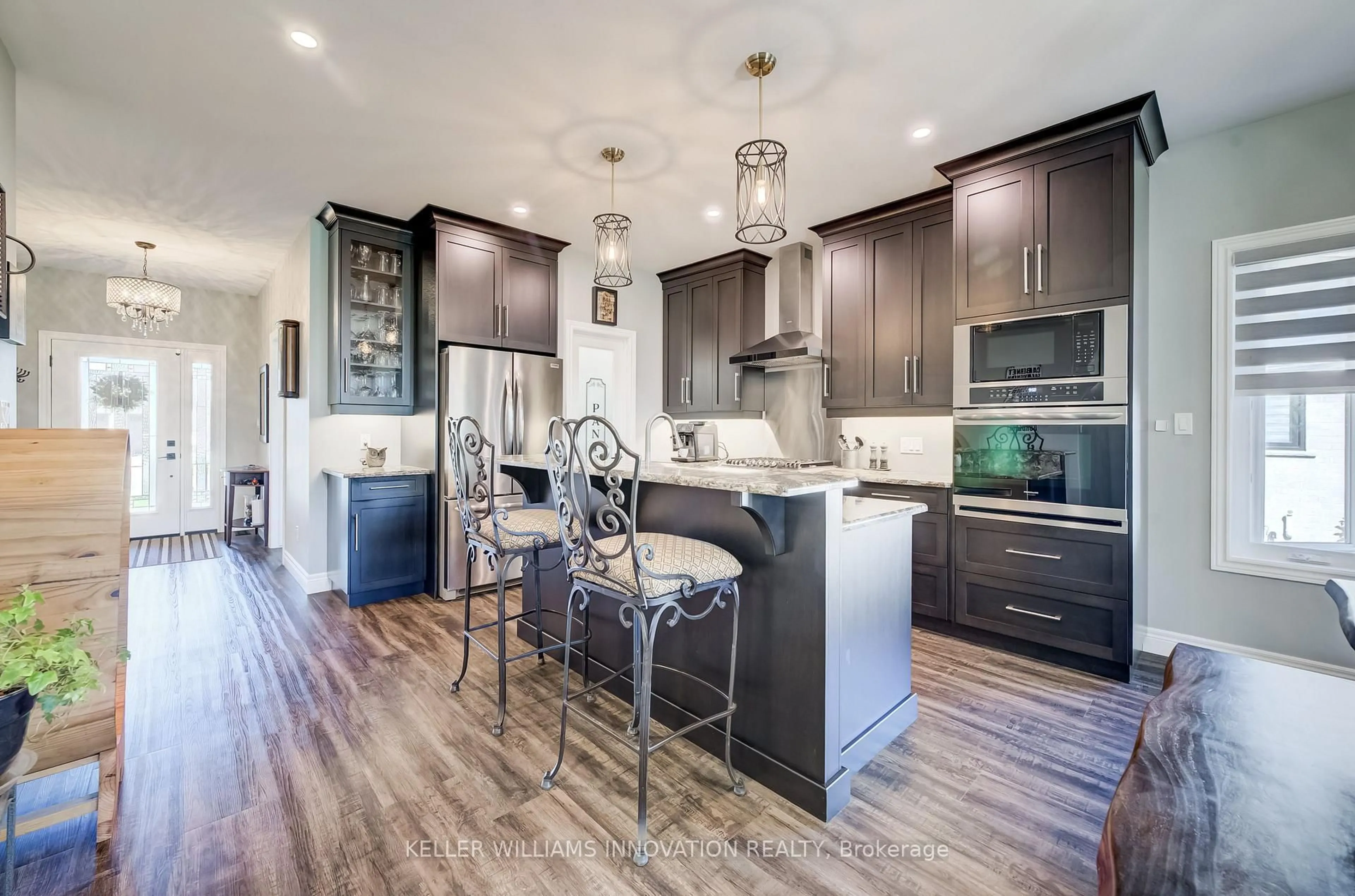 Contemporary kitchen, wood/laminate floor for 23 Winchester Cres, North Perth Ontario N4W 0J8