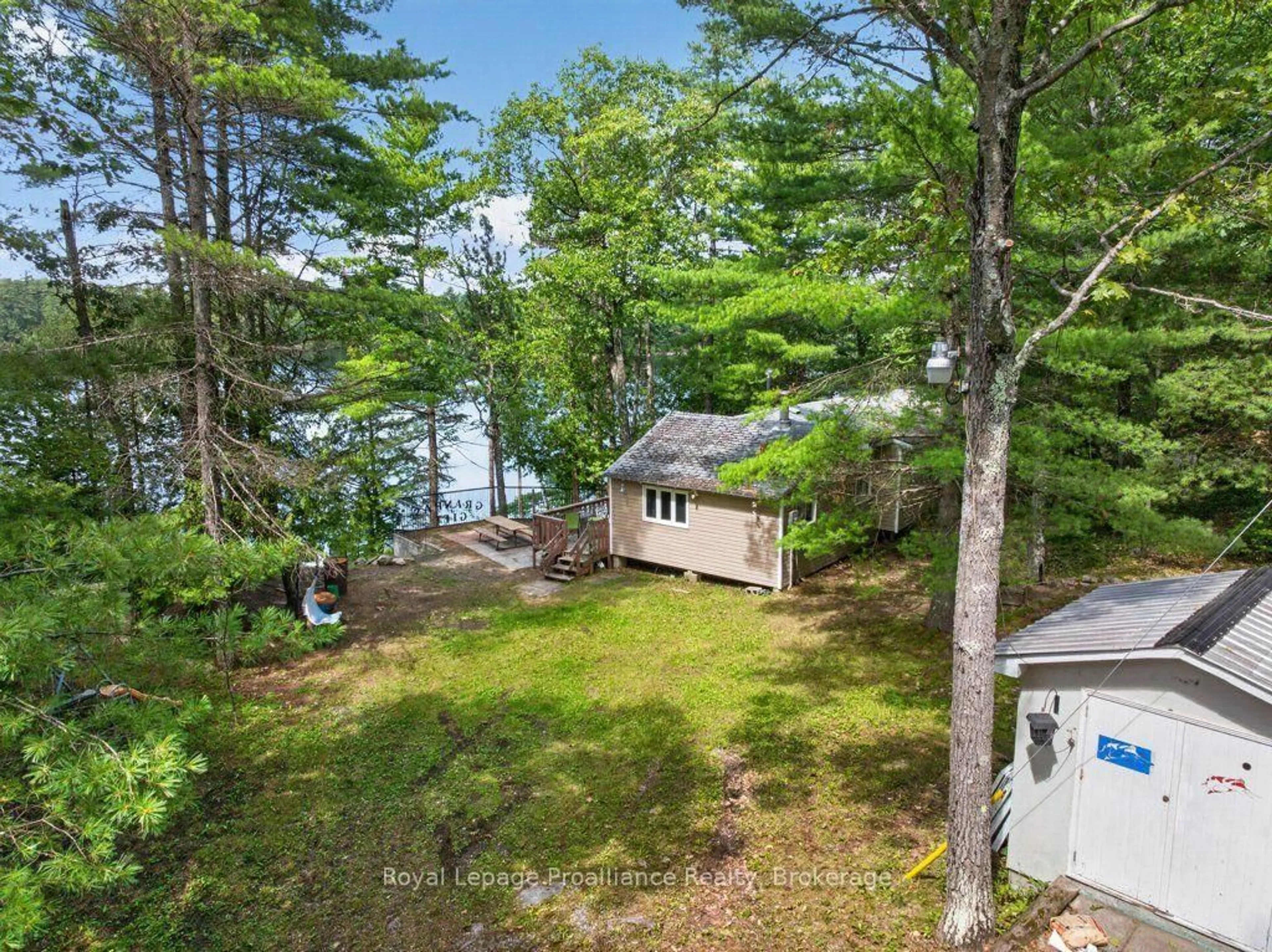 A pic from outside/outdoor area/front of a property/back of a property/a pic from drone, water/lake/river/ocean view for 1138 Helen Lane, Mountain Grove Ontario K0H 2E0