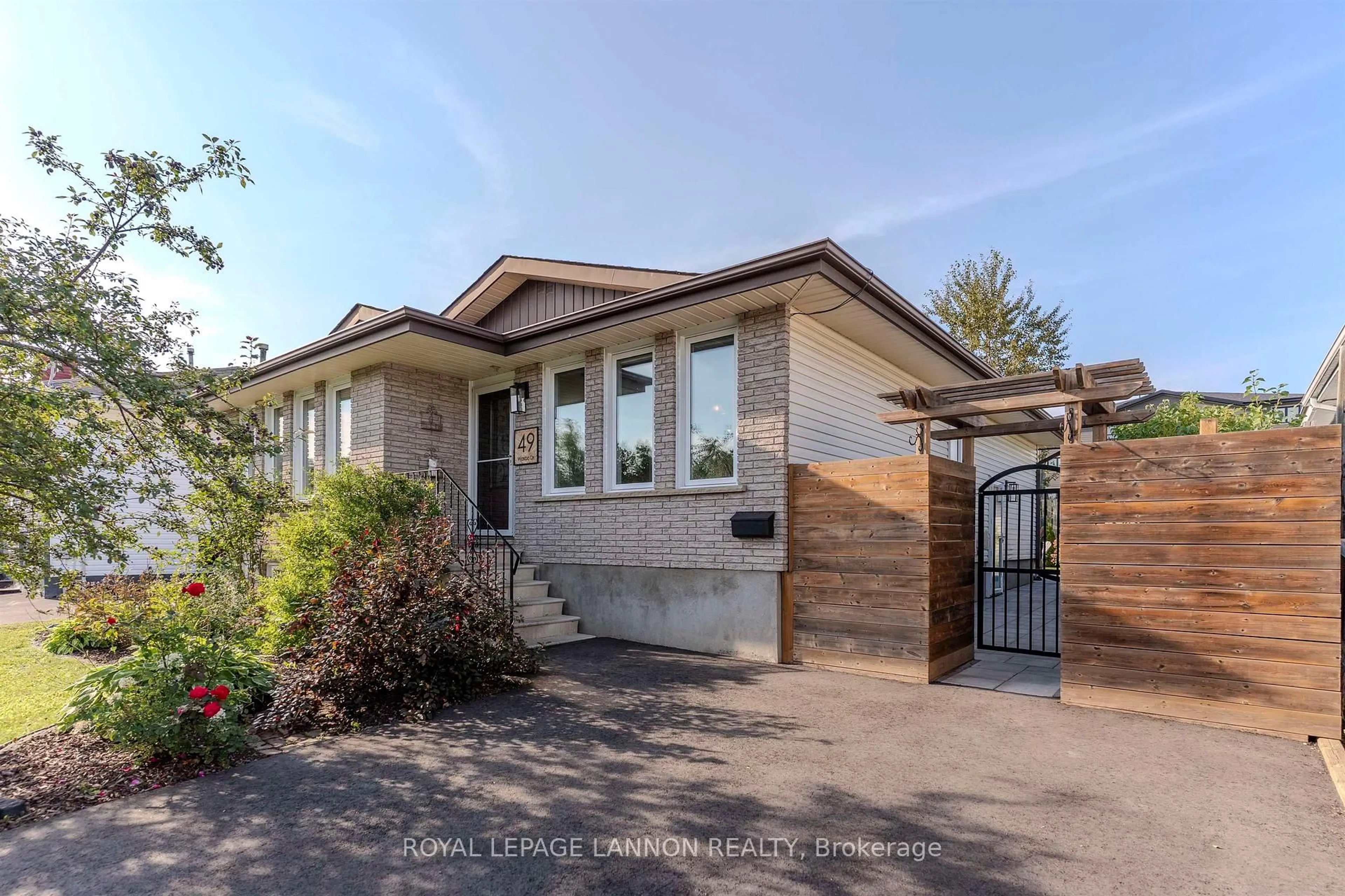 Home with brick exterior material, street for 49 Wasco Dr, Thunder Bay Ontario P7G 1A2
