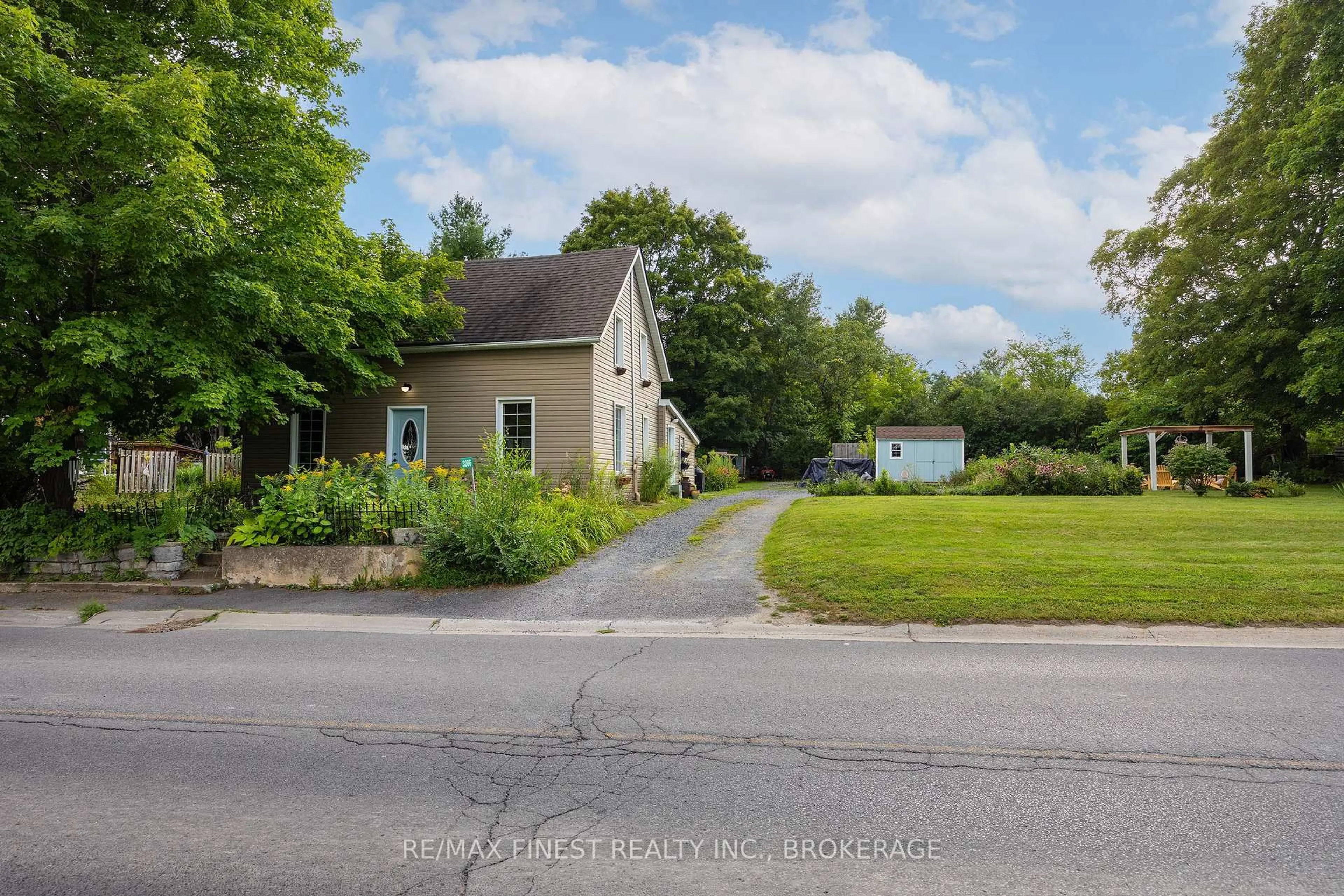 A pic from outside/outdoor area/front of a property/back of a property/a pic from drone, street for 3286 COUNTY ROAD 6, Yarker Ontario K0K 3N0