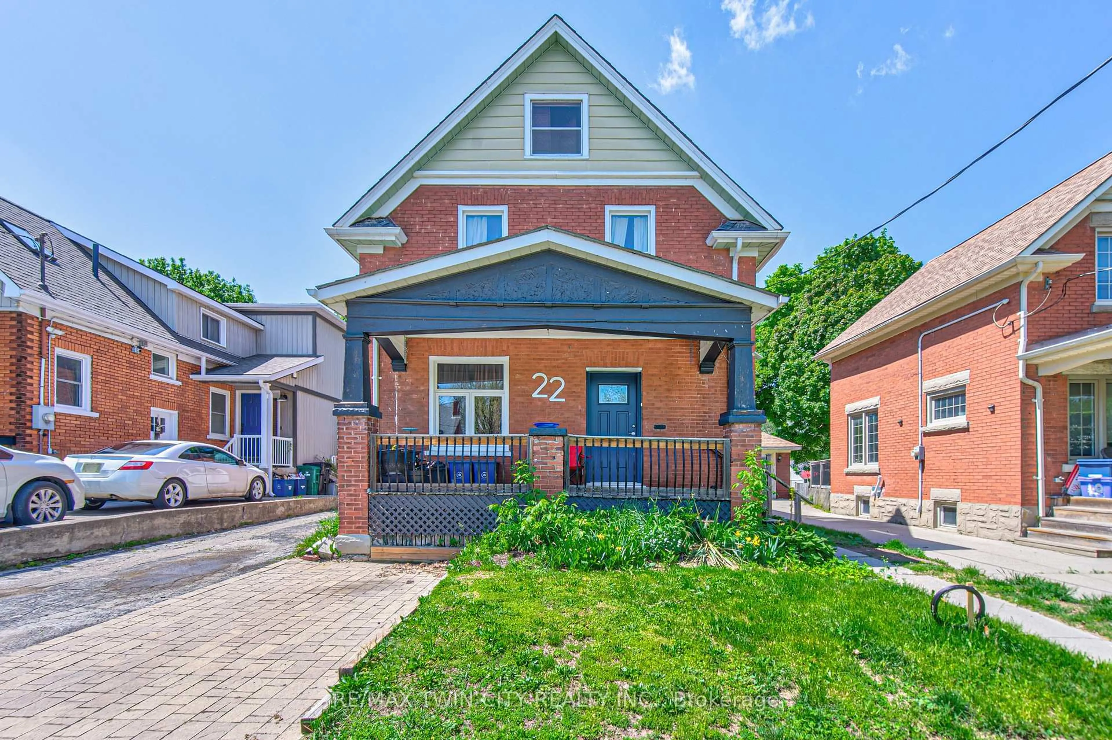 Home with brick exterior material, street for 22 Herlan Ave, Kitchener Ontario N2G 4K3