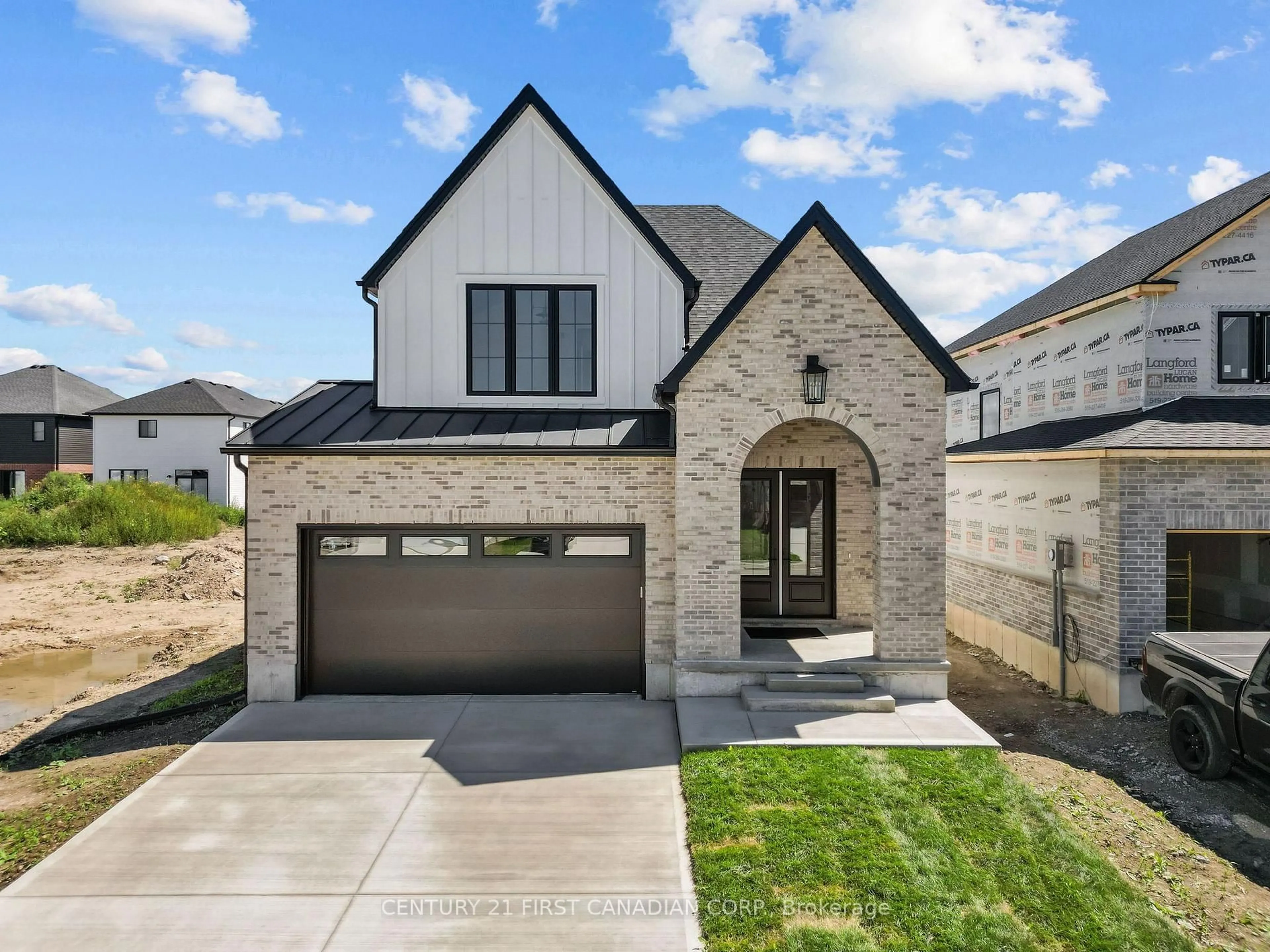 Home with brick exterior material, street for 24 Sheldabren St, North Middlesex Ontario N0M 1A0