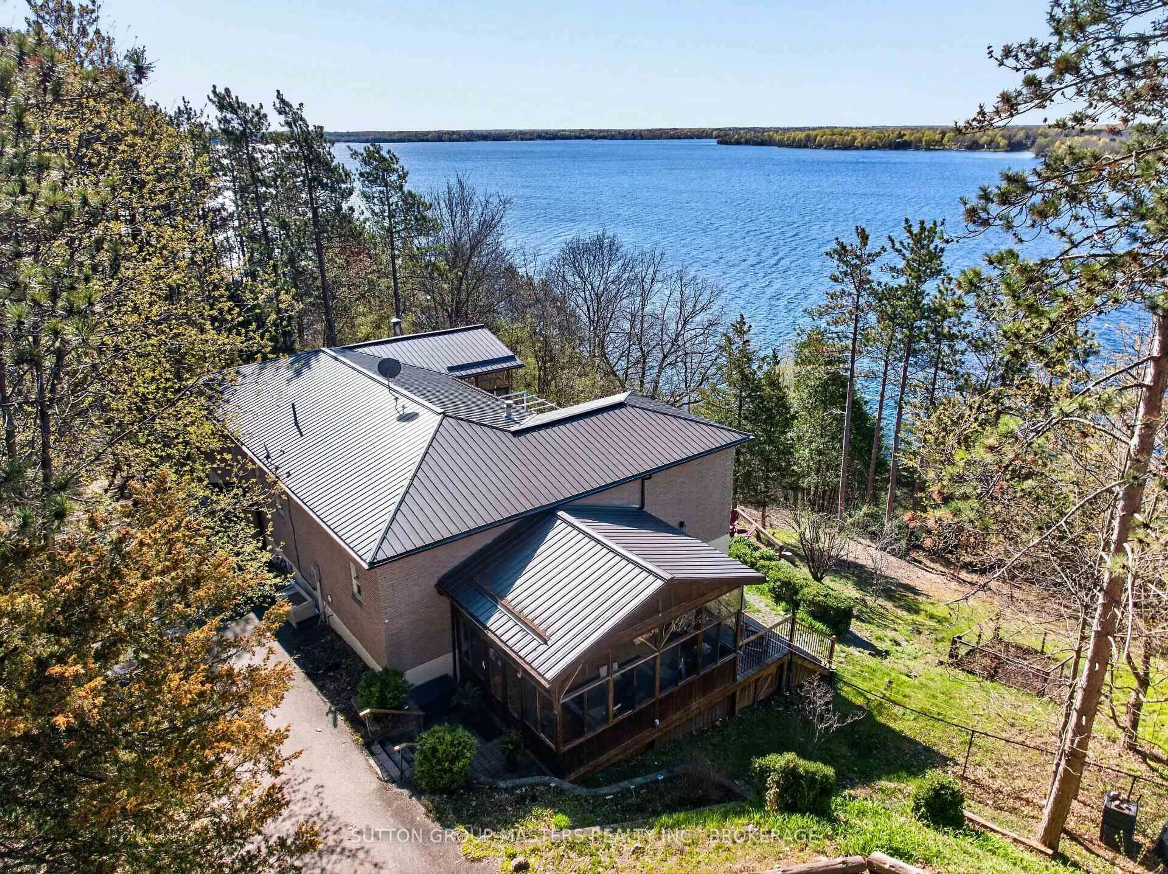 A pic from outside/outdoor area/front of a property/back of a property/a pic from drone, water/lake/river/ocean view for 715 North Shore Rd, Rideau Lakes Ontario K0G 1X0
