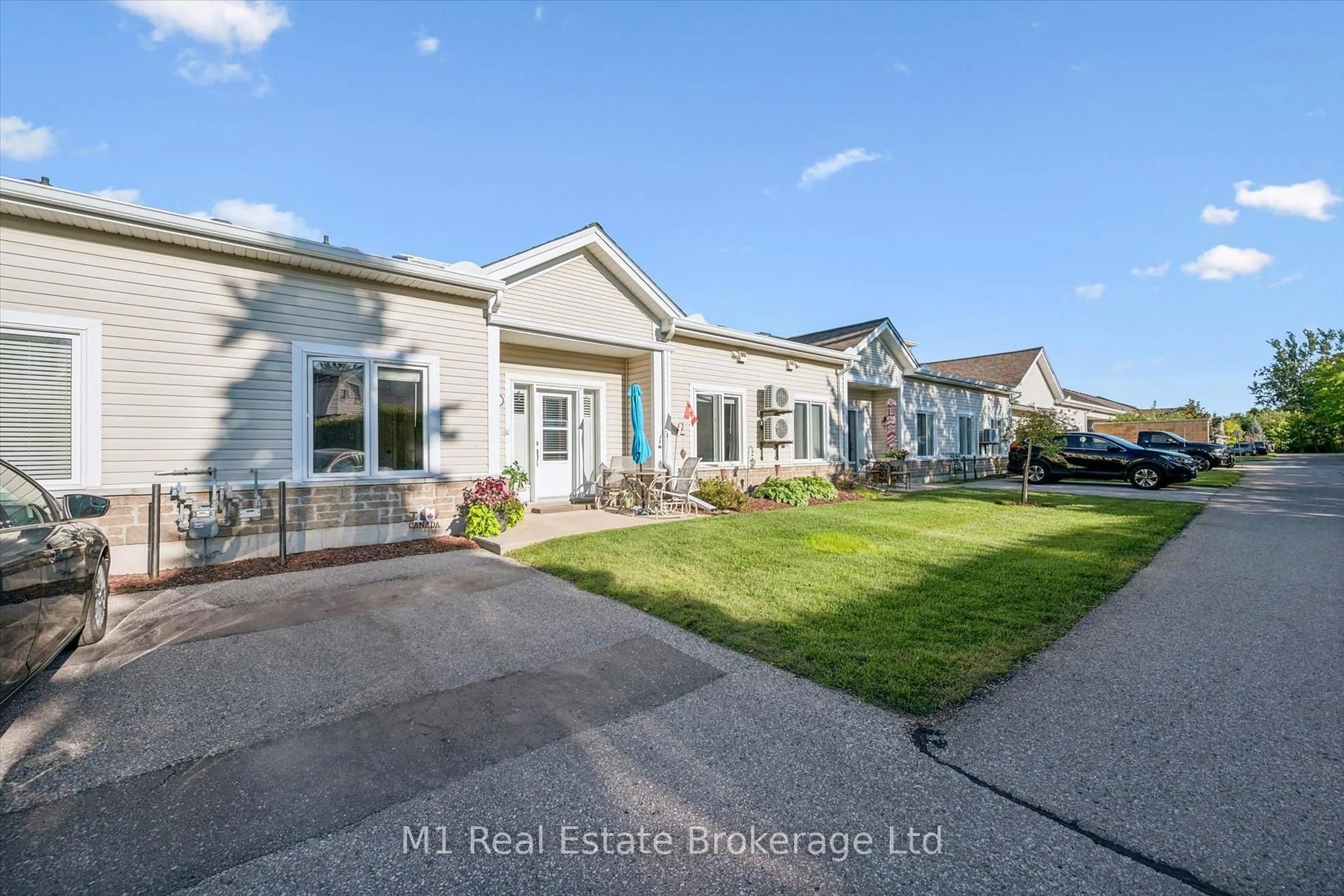 A pic from outside/outdoor area/front of a property/back of a property/a pic from drone, street for 760 Woodhill Dr #104, Centre Wellington Ontario N1M 3W5