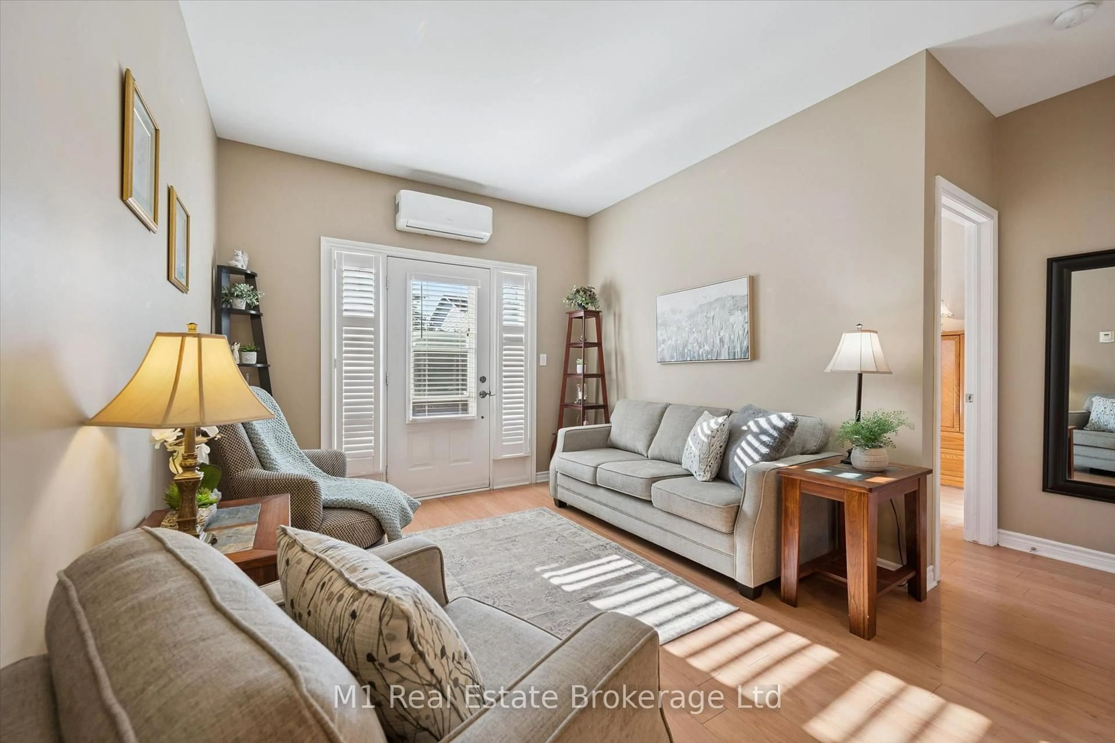 Living room with furniture, unknown for 760 Woodhill Dr #104, Centre Wellington Ontario N1M 3W5