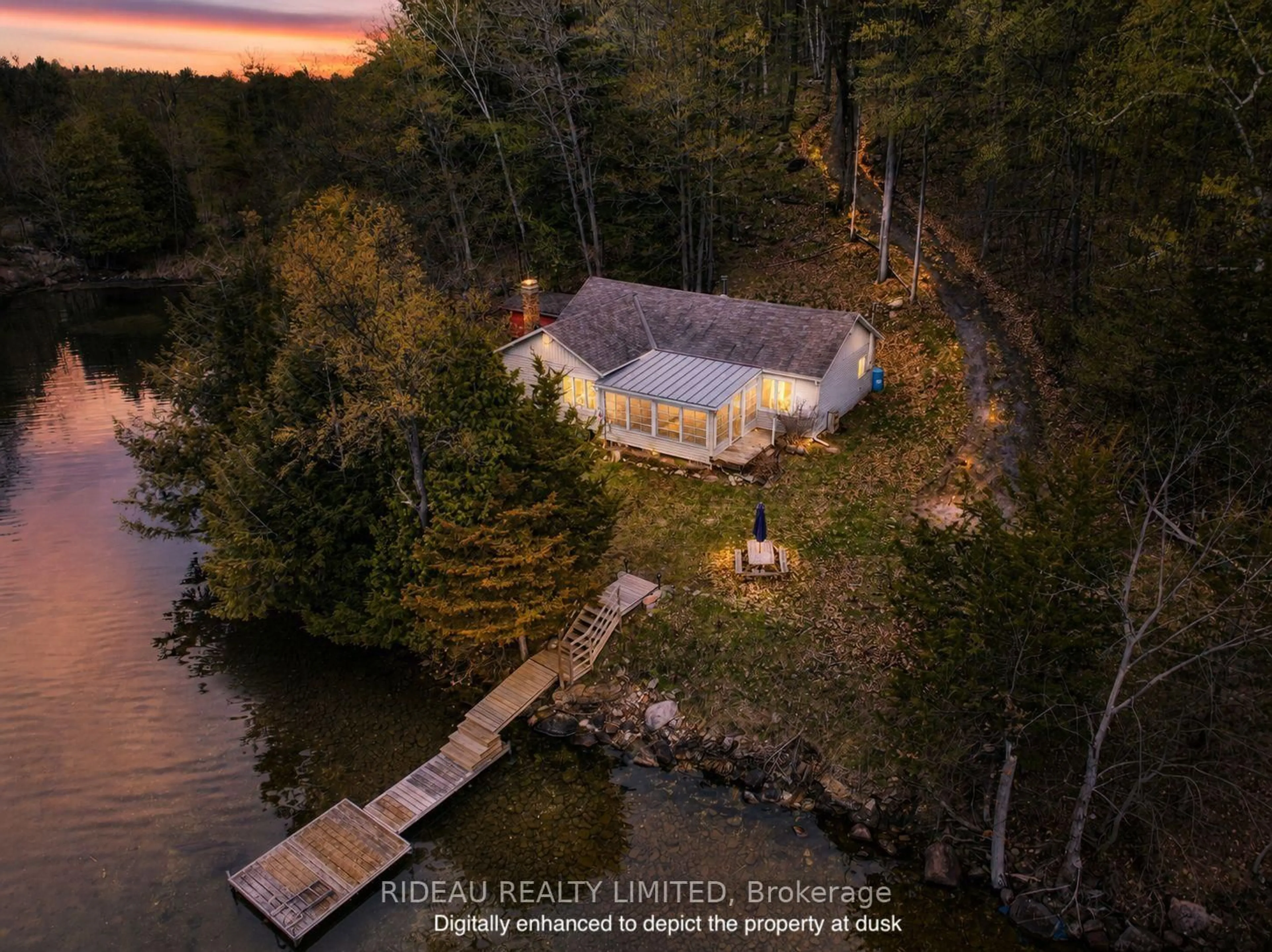 A pic from outside/outdoor area/front of a property/back of a property/a pic from drone, water/lake/river/ocean view for 9 Sparrow Lane, Rideau Lakes Ontario K0G 1V0