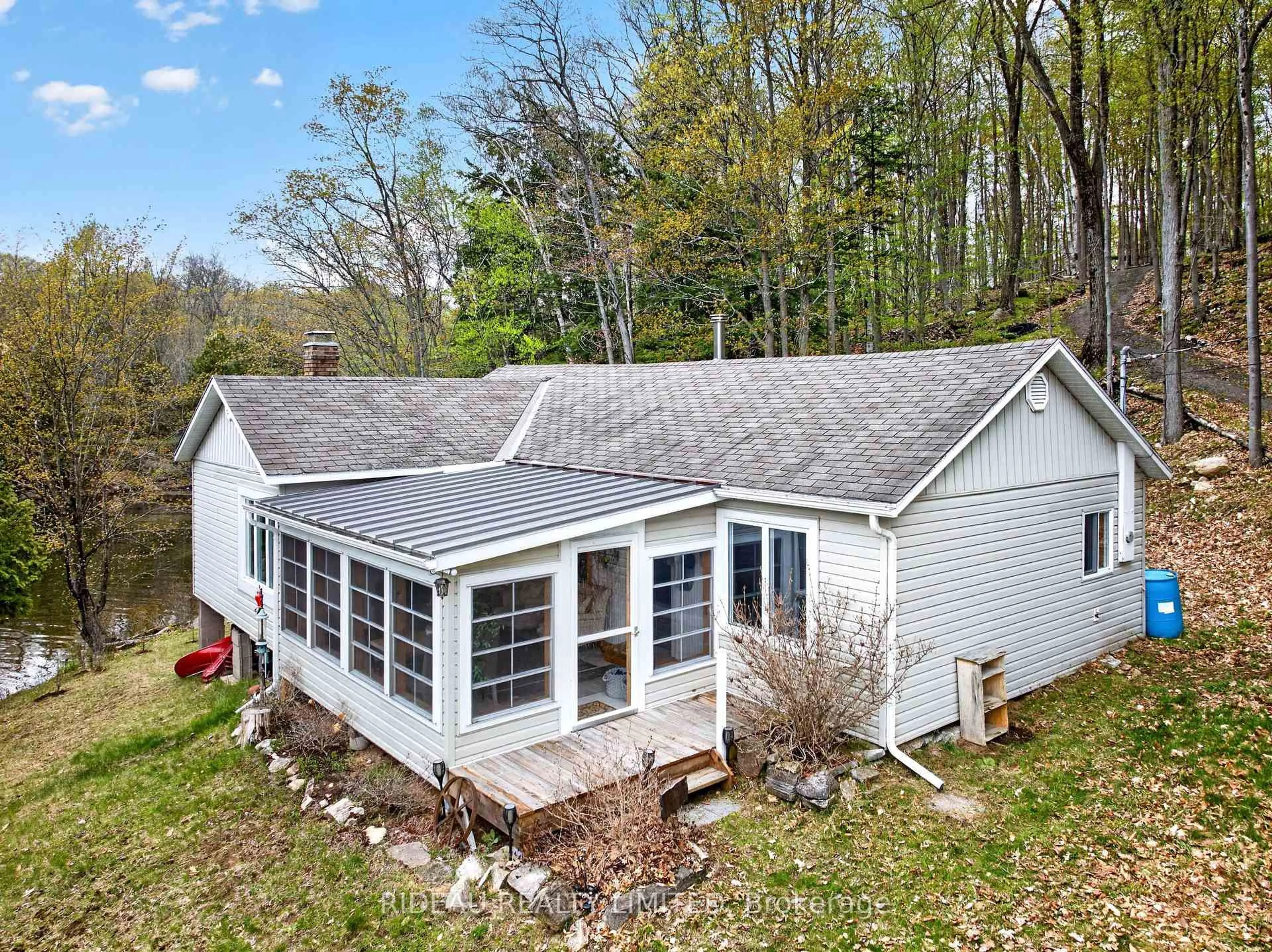 A pic from outside/outdoor area/front of a property/back of a property/a pic from drone, water/lake/river/ocean view for 9 Sparrow Lane, Rideau Lakes Ontario K0G 1V0