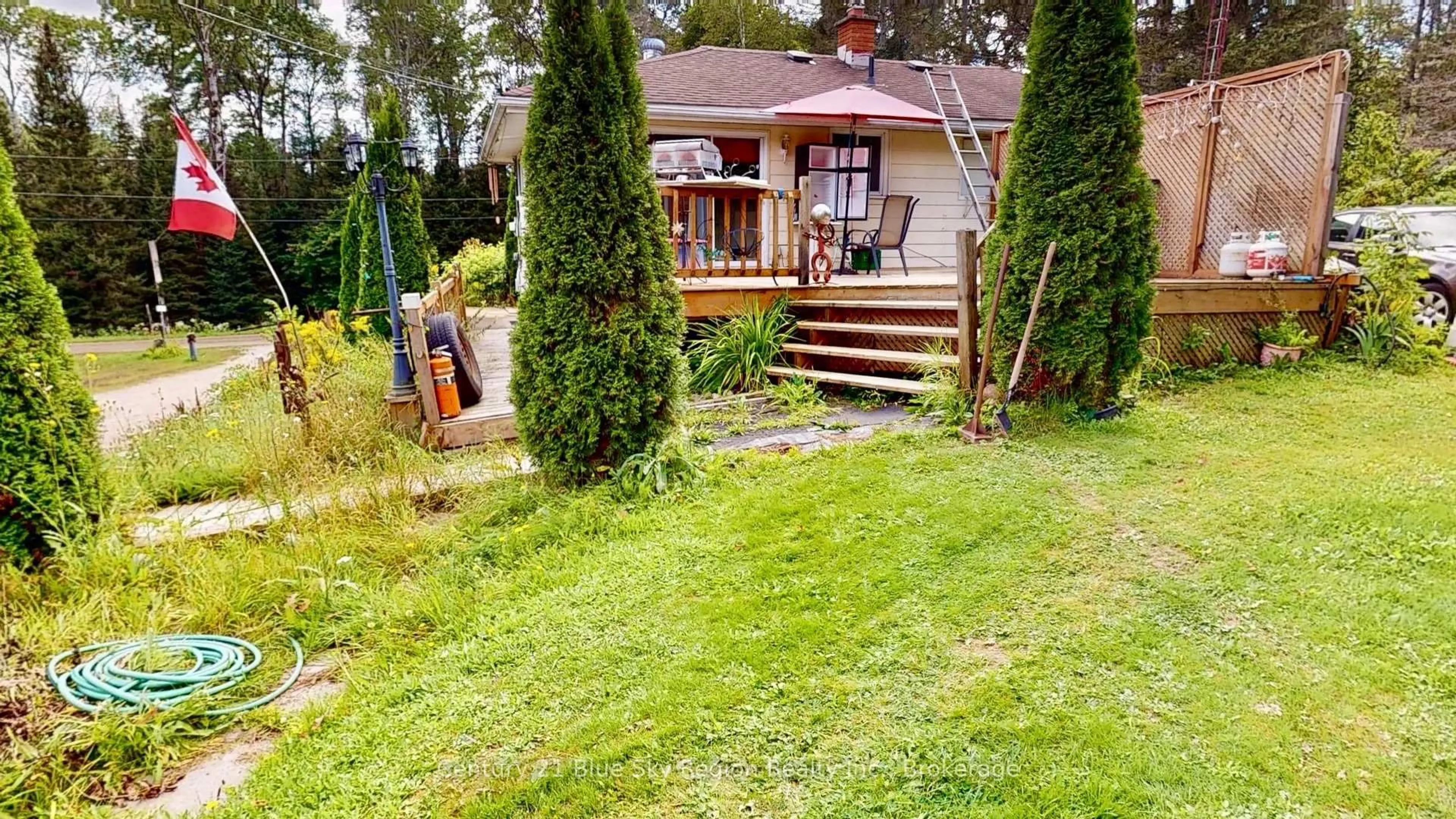 A pic from outside/outdoor area/front of a property/back of a property/a pic from drone, street for 76 S. Horn Lake Rd, Burk's Falls Ontario P0A 1C0