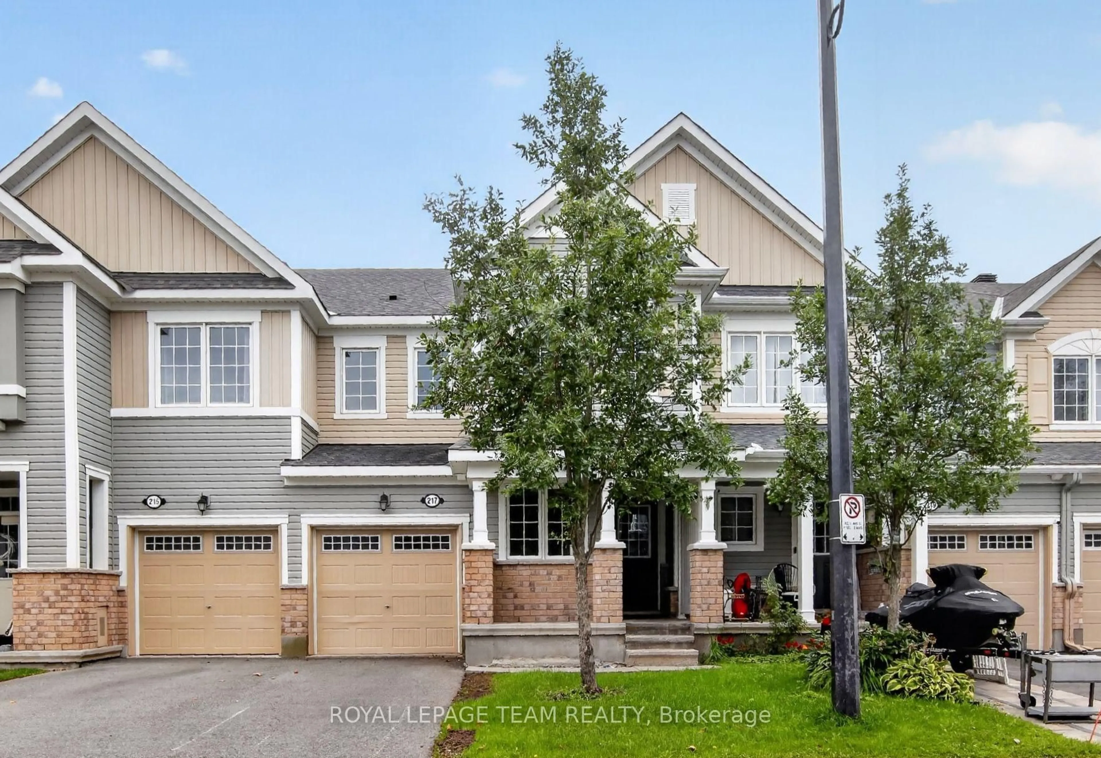 Home with brick exterior material, street for 217 Conifer Creek Circ, Ottawa Ontario K2M 0M2
