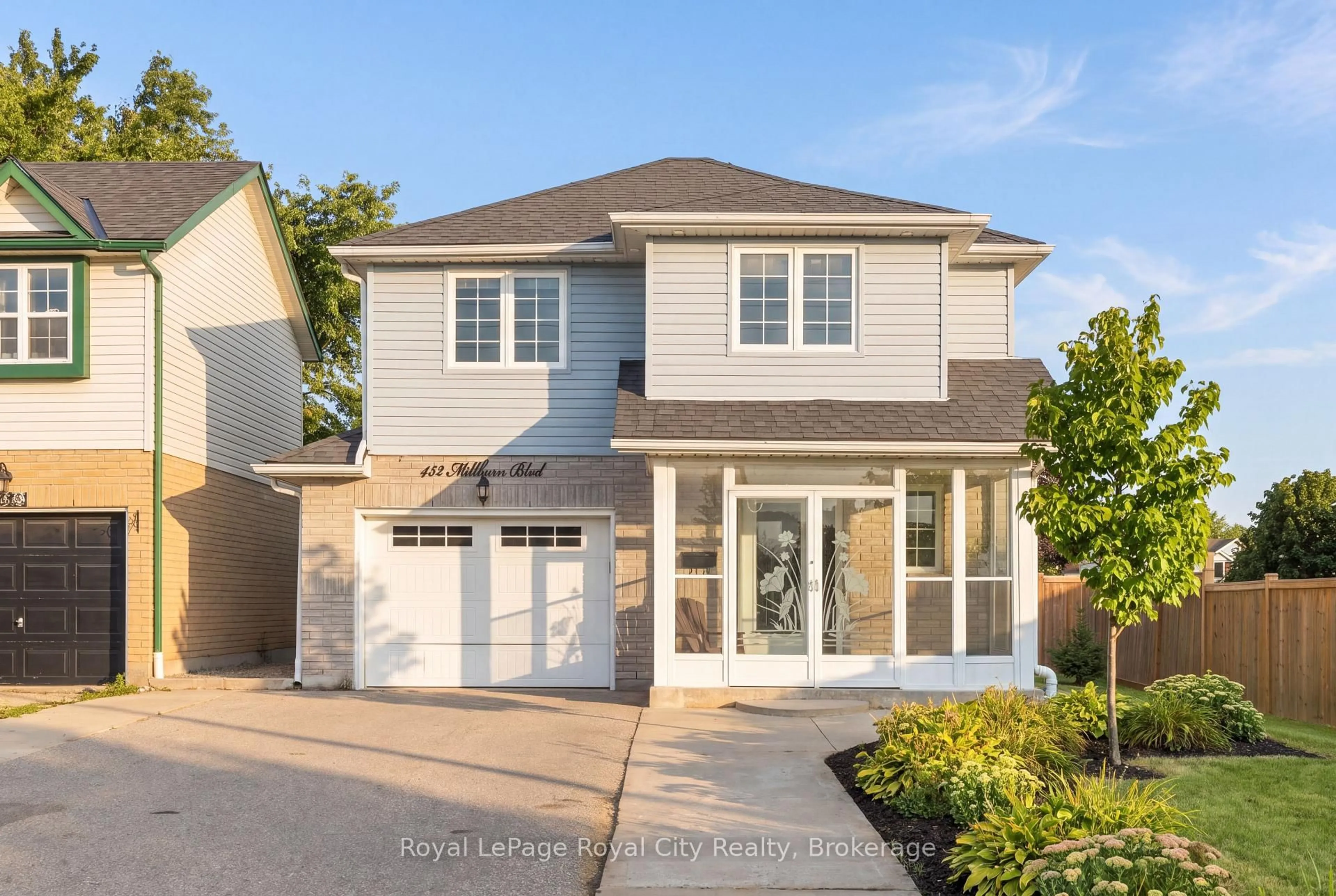 Home with vinyl exterior material, street for 452 Millburn Blvd, Centre Wellington Ontario N1M 3P1