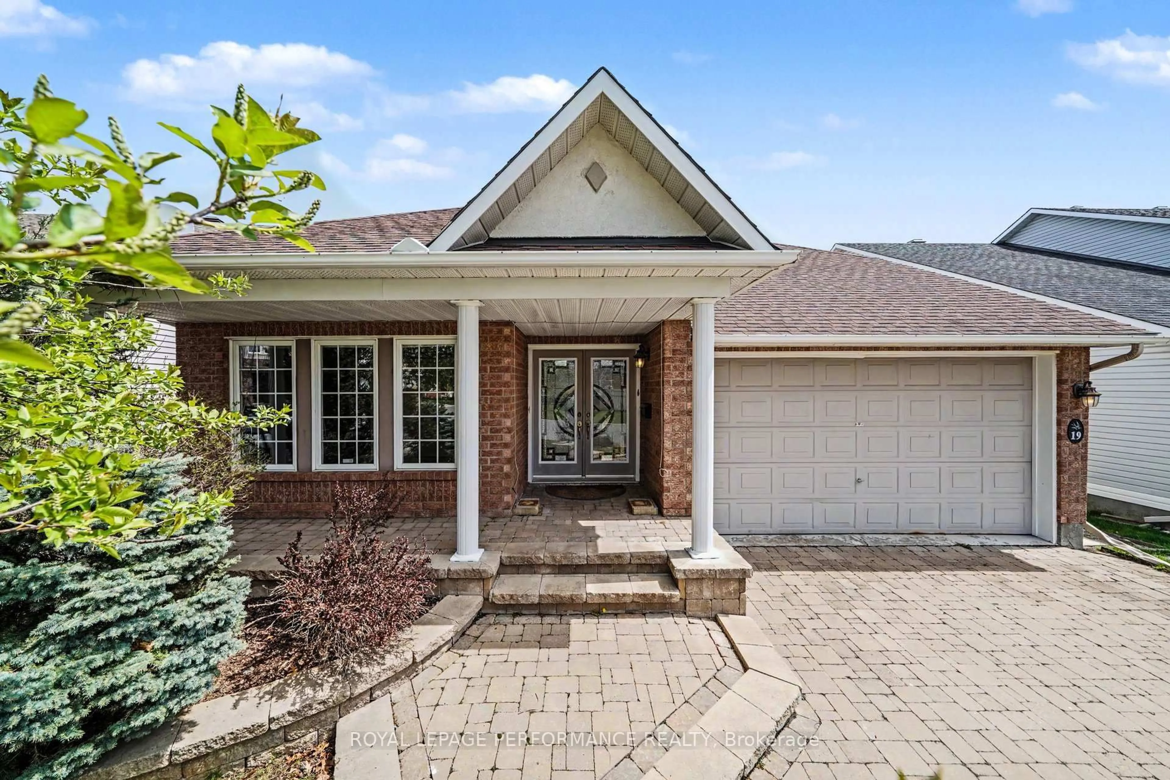 Home with brick exterior material, street for 19 Settlers Ridge Way, Ottawa Ontario K2J 4V3