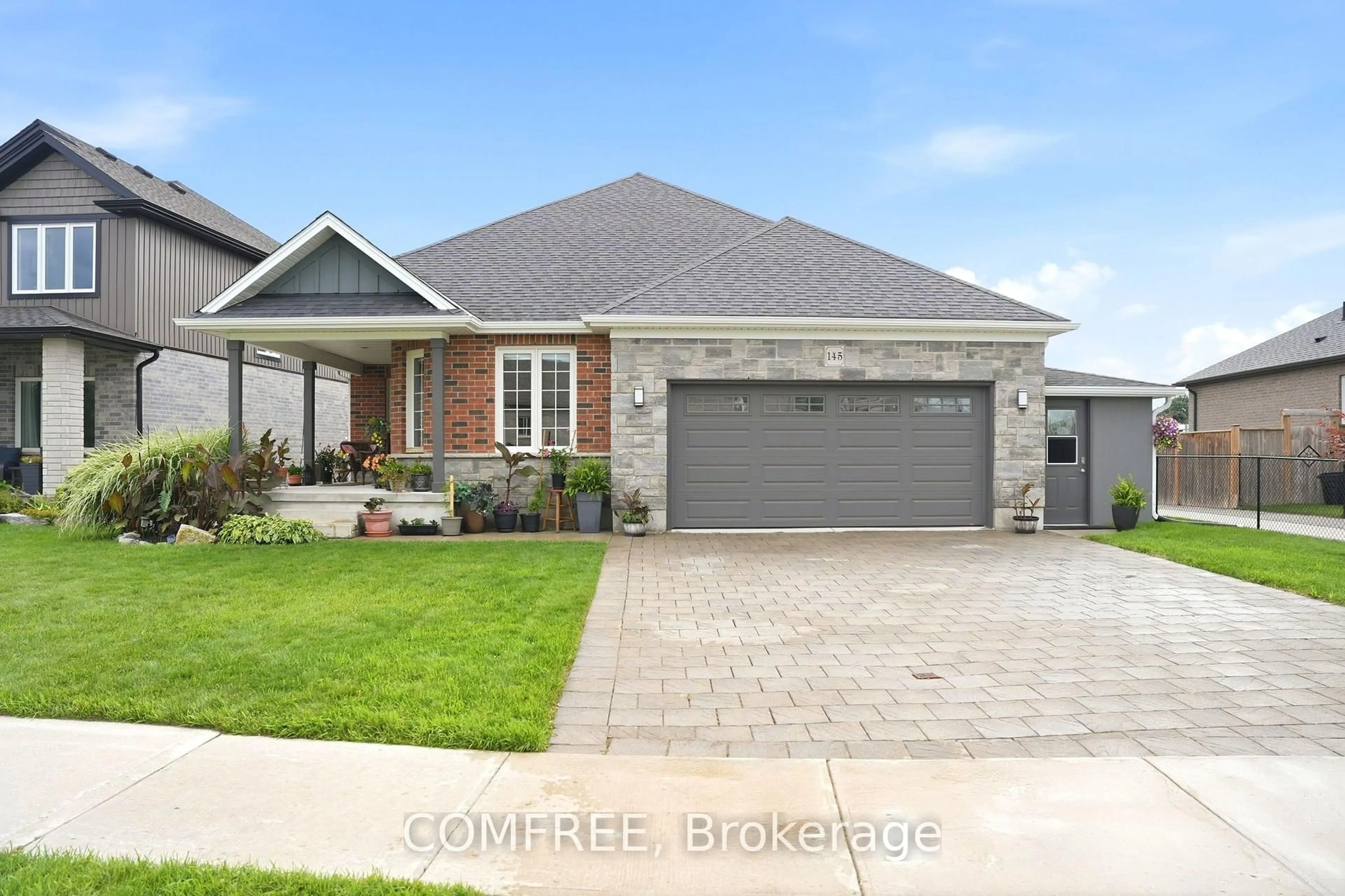 Home with brick exterior material, street for 145 Spencer Ave, Lucan Biddulph Ontario N0M 2J0