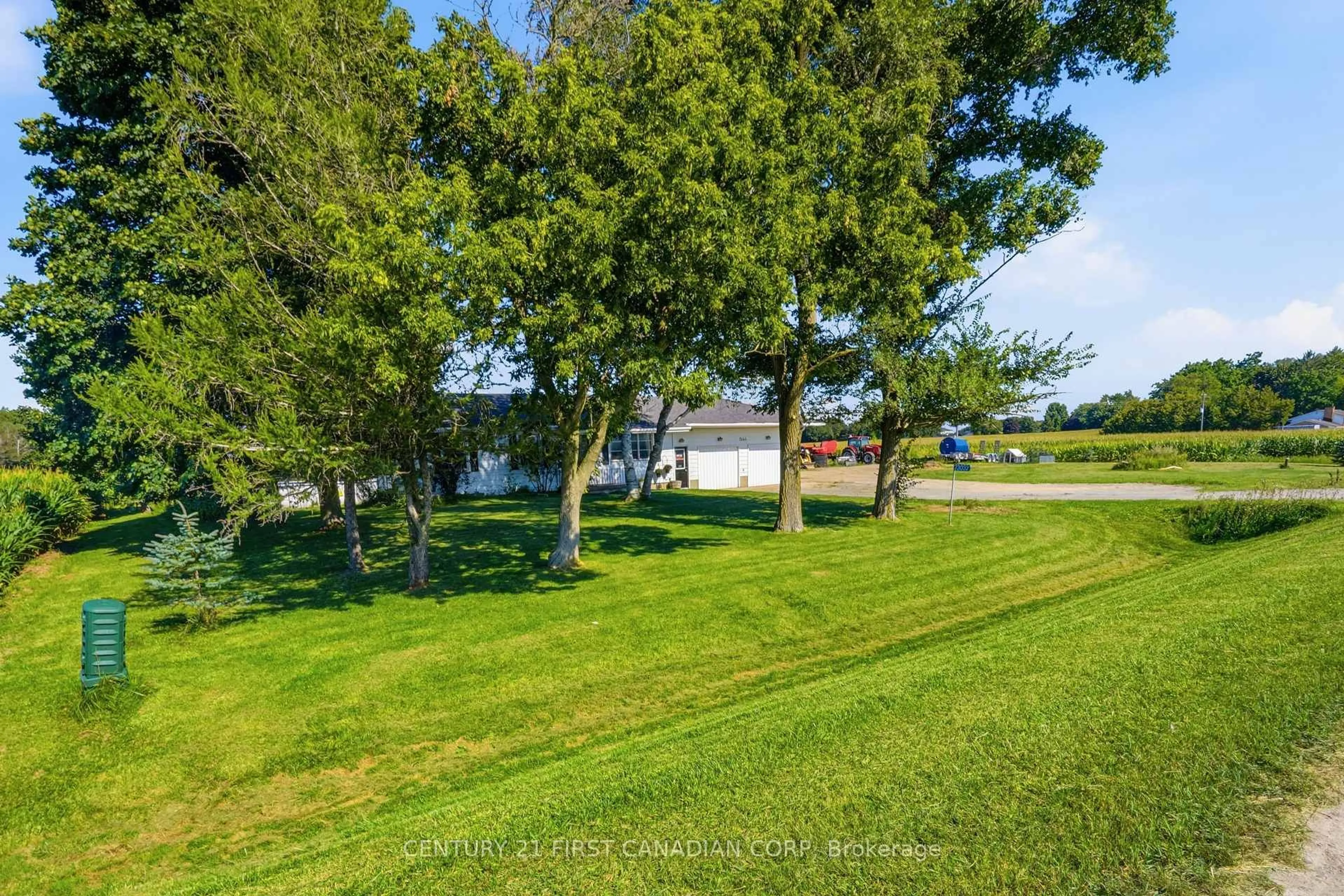 A pic from outside/outdoor area/front of a property/back of a property/a pic from drone, water/lake/river/ocean view for 23032 Highbury Ave, Middlesex Centre Ontario N0M 2A0