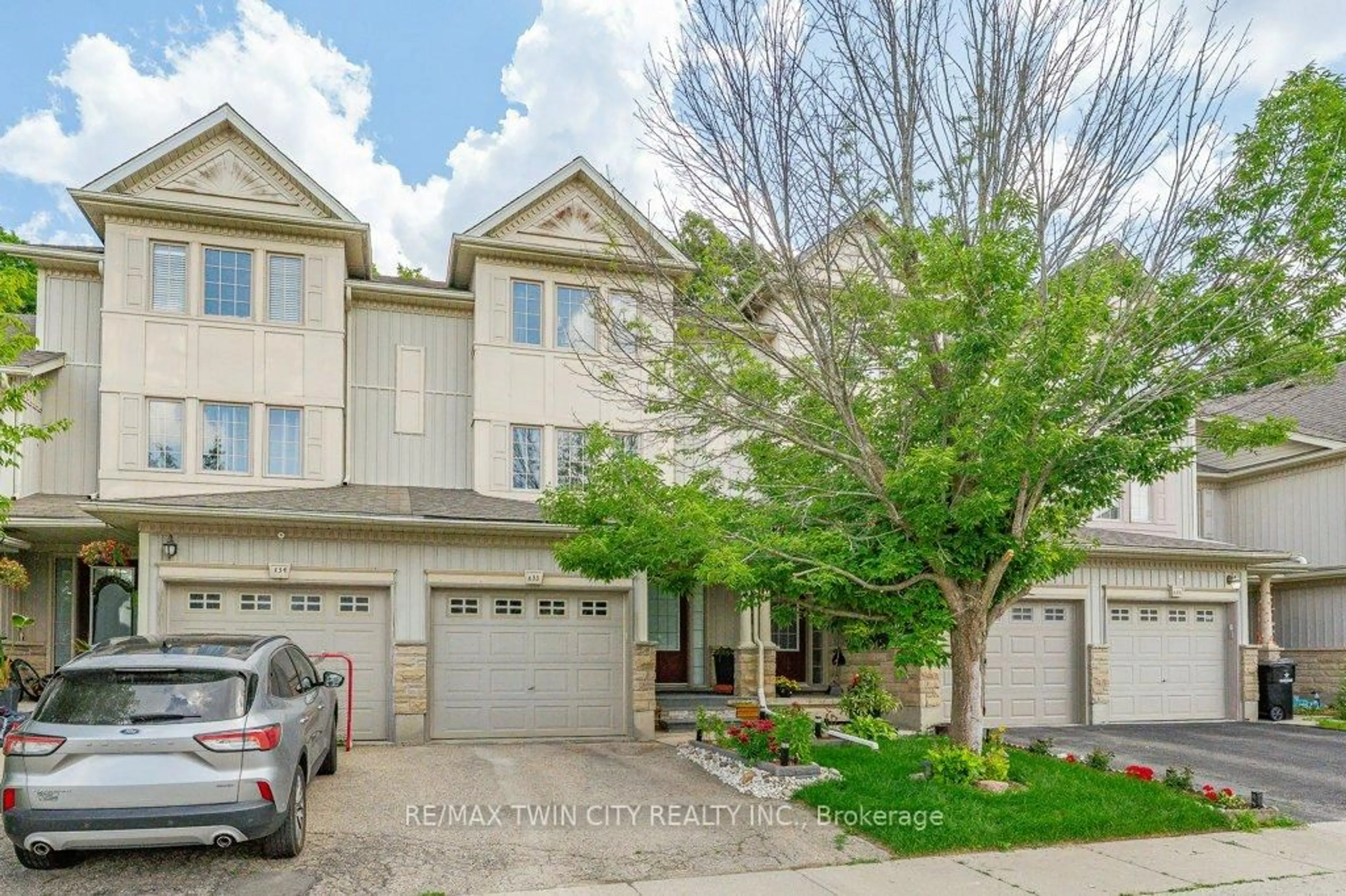 A pic from outside/outdoor area/front of a property/back of a property/a pic from drone, street for 110 Activa Ave #E33, Kitchener Ontario N2E 4K4