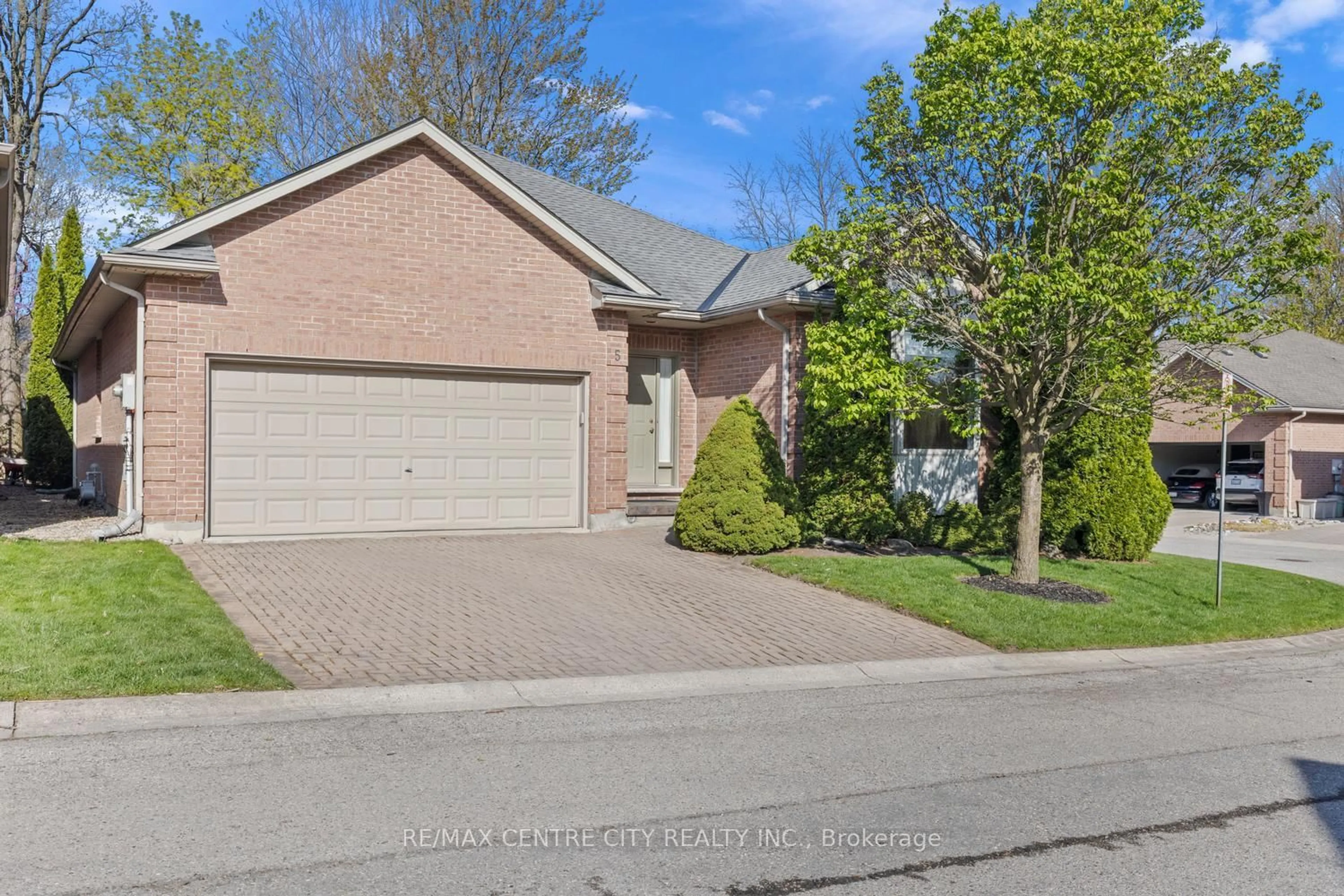 Home with brick exterior material, street for 448 Commissioners Rd #5, London South Ontario N6C 2T7