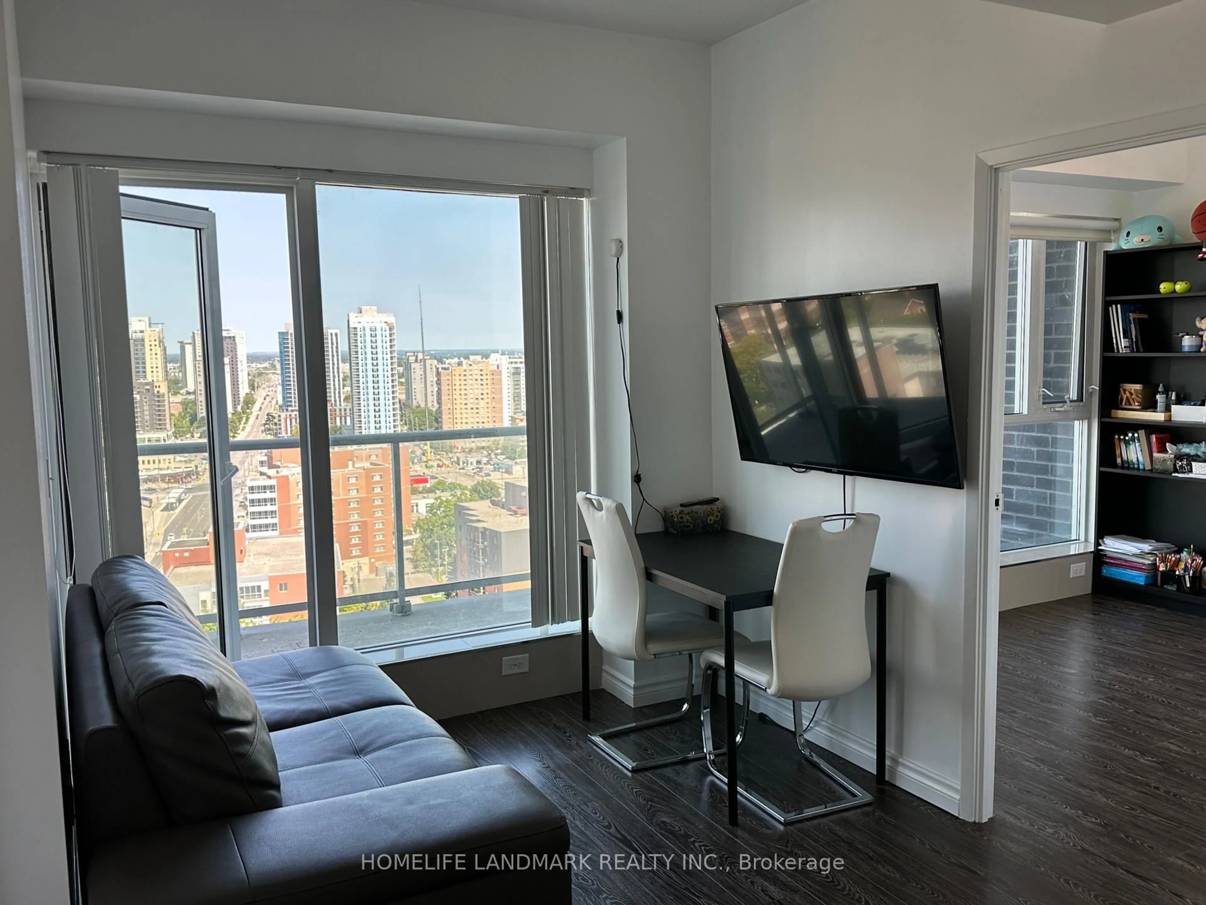 Living room with furniture, wood/laminate floor for 158 KING St #2004, Waterloo Ontario N2J 0E5